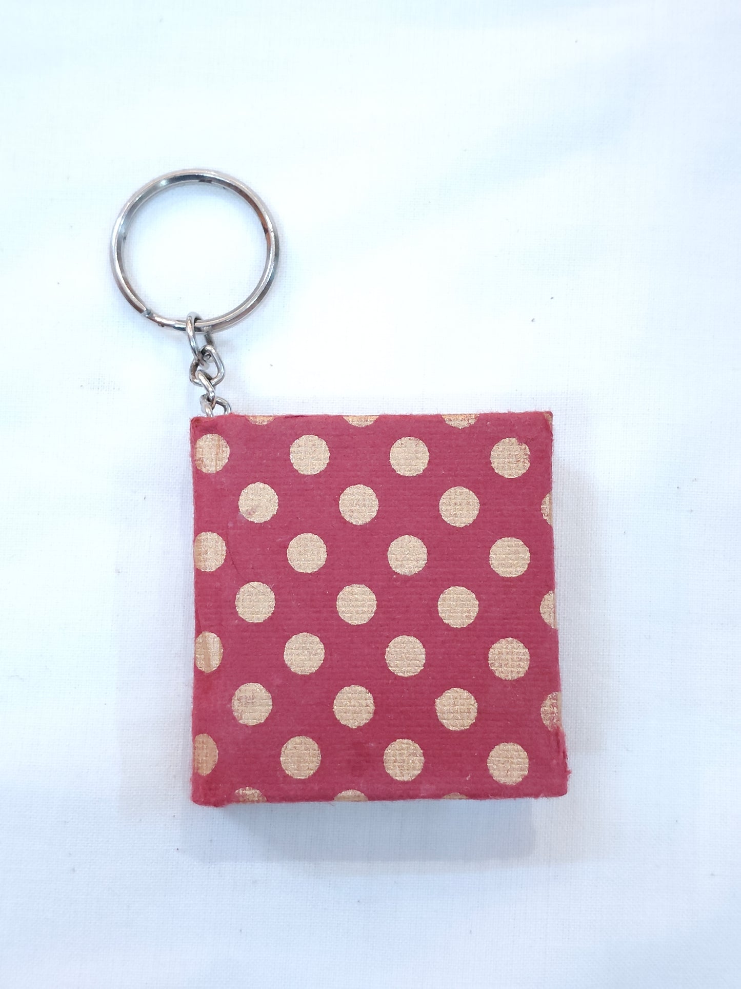 Key ring with small hand made paper notebook