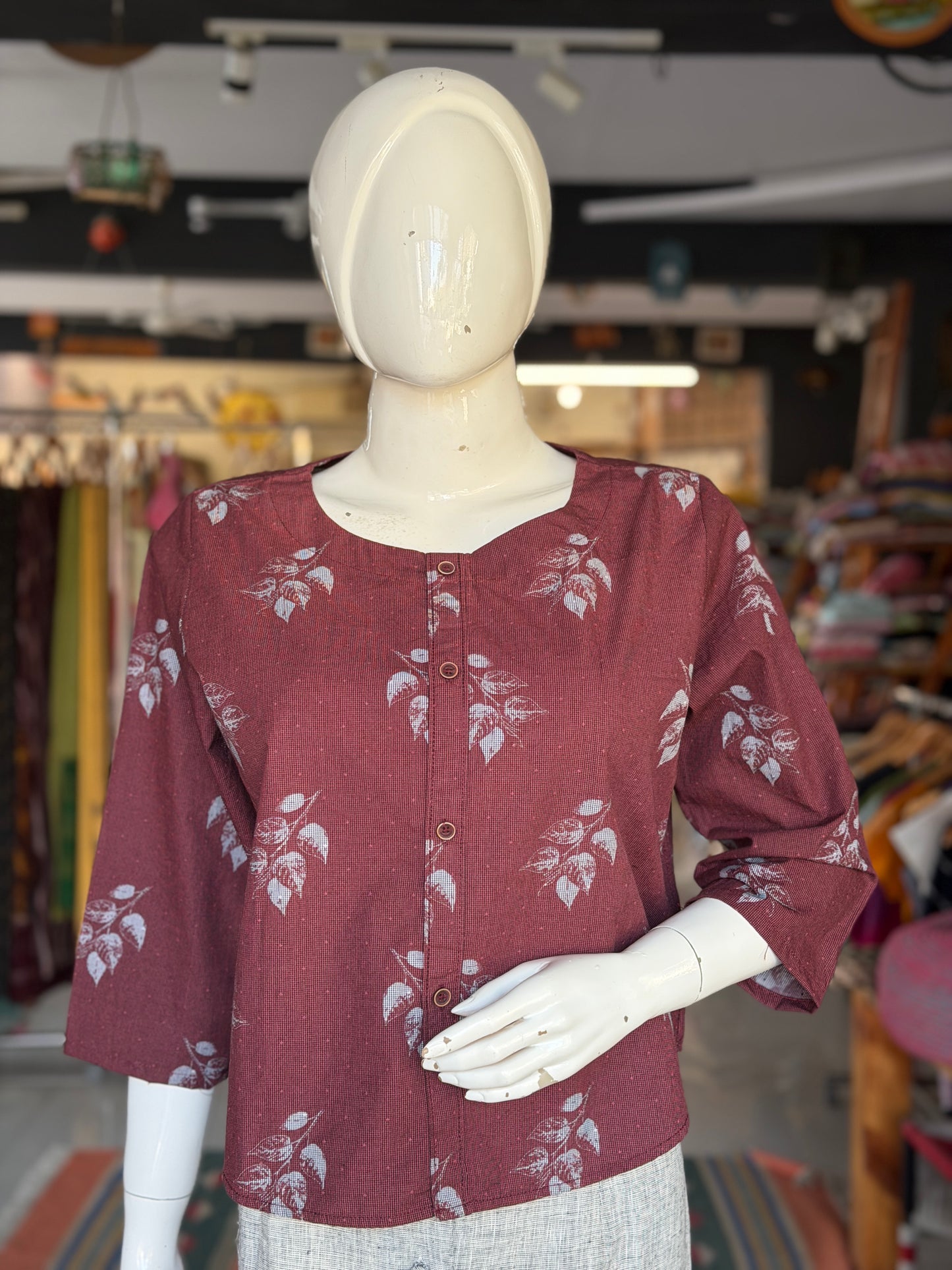 Maroon leaves print cotton top with front button detailing