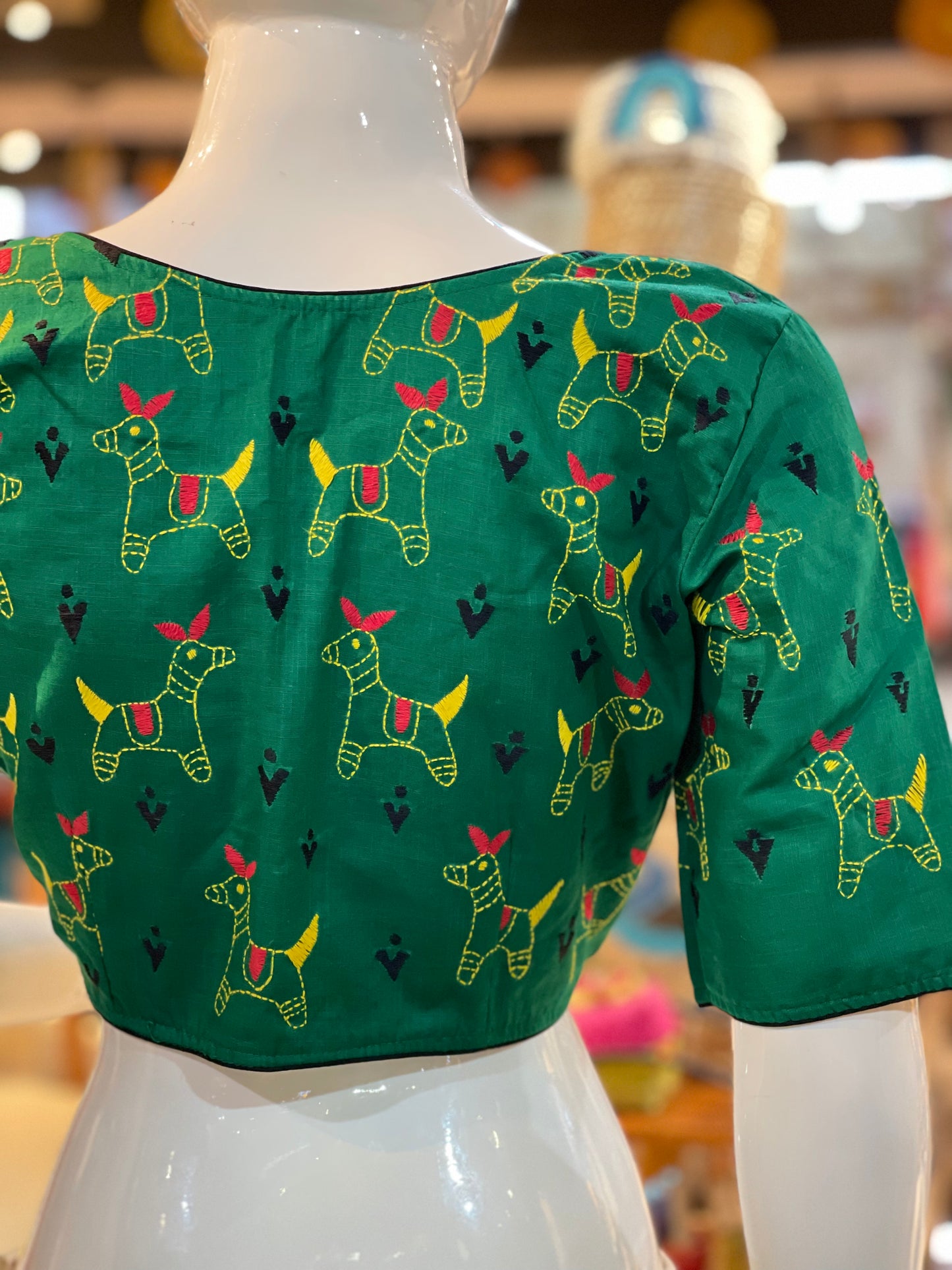 Green cotton hand embroidered kantha work blouse with lace and animals embroidery on back