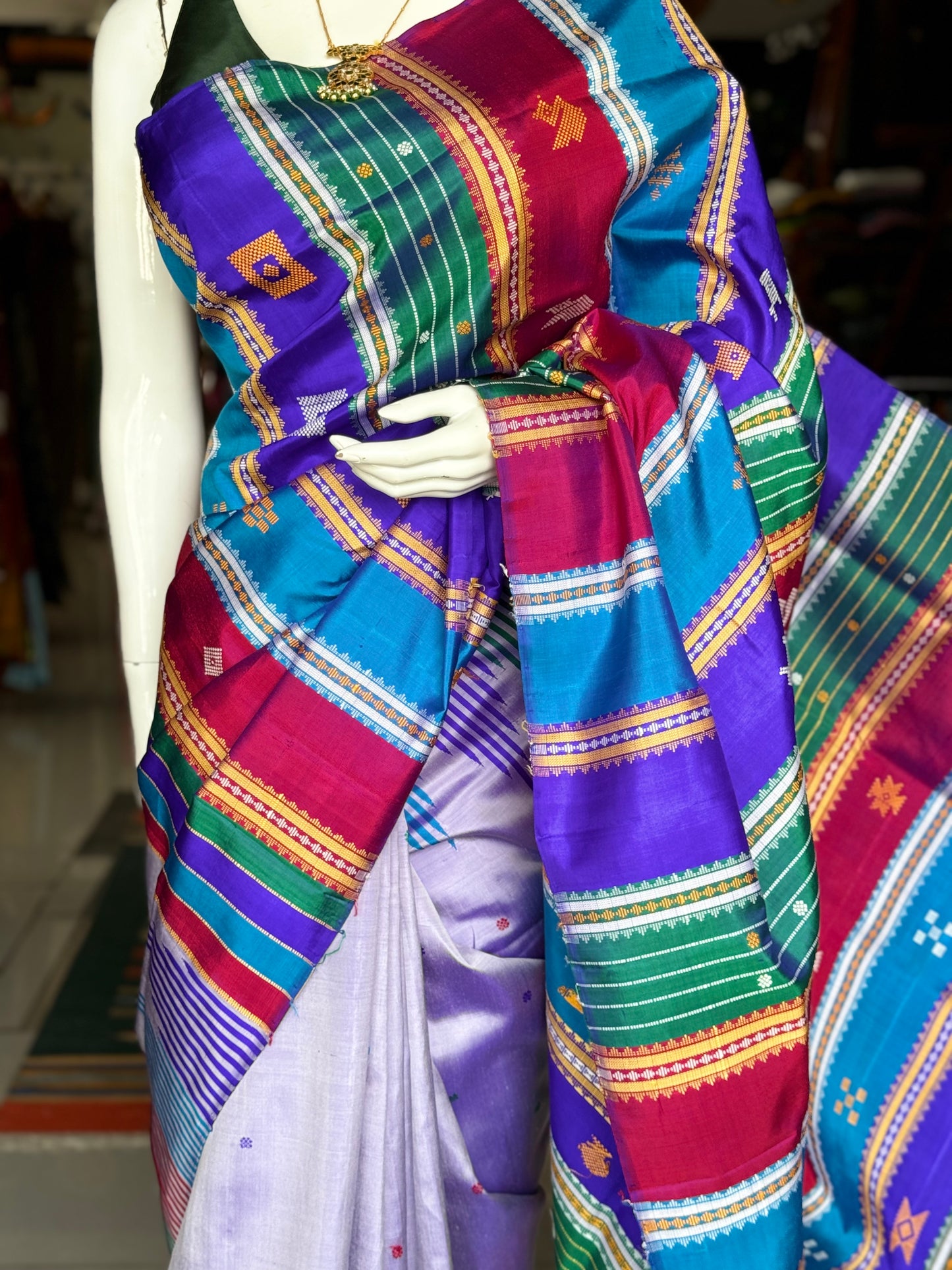 Lavender Brahmapuri silk handwoven saree with unique stripes temple border and colourful double palla