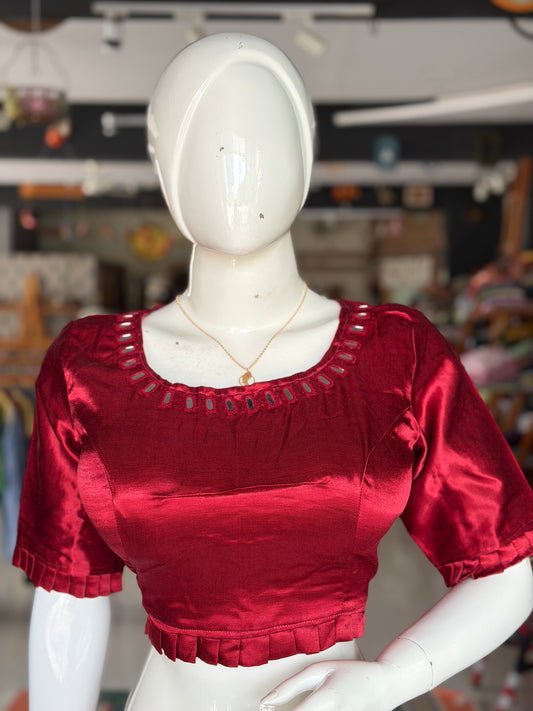 Maroon mashru plain blouse with mirror work on front and back; pleated waist line