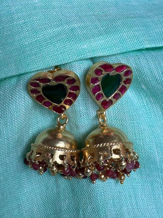 Pink and green kundans heart shaped studs with gold polish plain jhumka earrings in 92.5 sterling silver