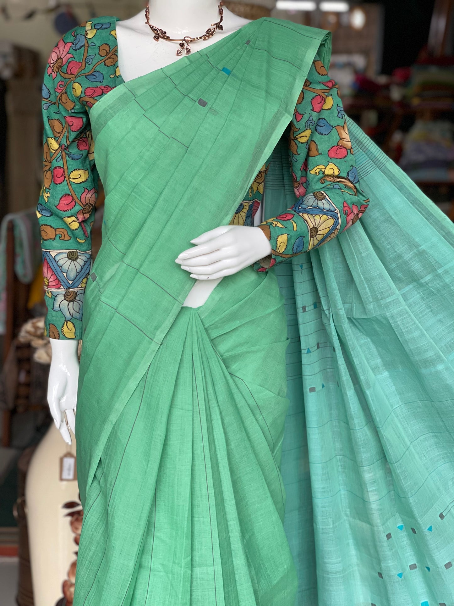 Serene Green and blue hand spun hand woven cotton saree with geometric butis