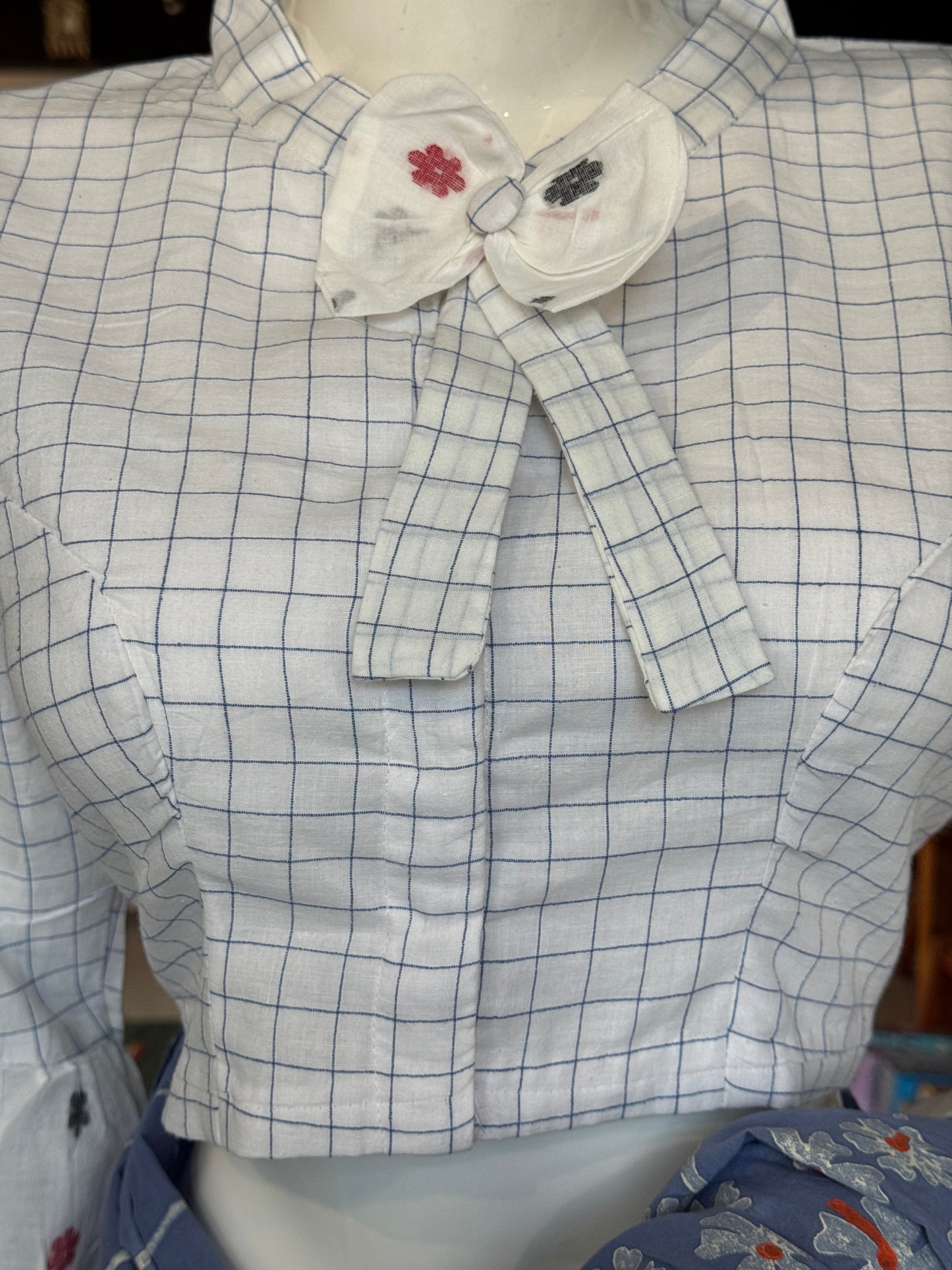 White n blue checks hand woven cotton Jamdani blouse with long balloon sleeves and bow neck