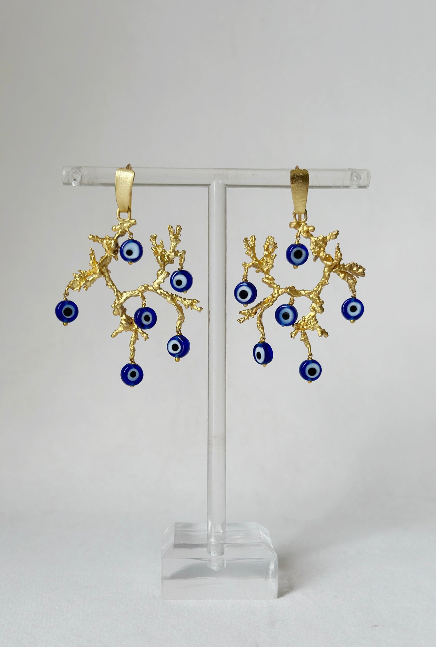 Evil eye chandelier earrings in gold plated brass - beautifully crafted designer earrings