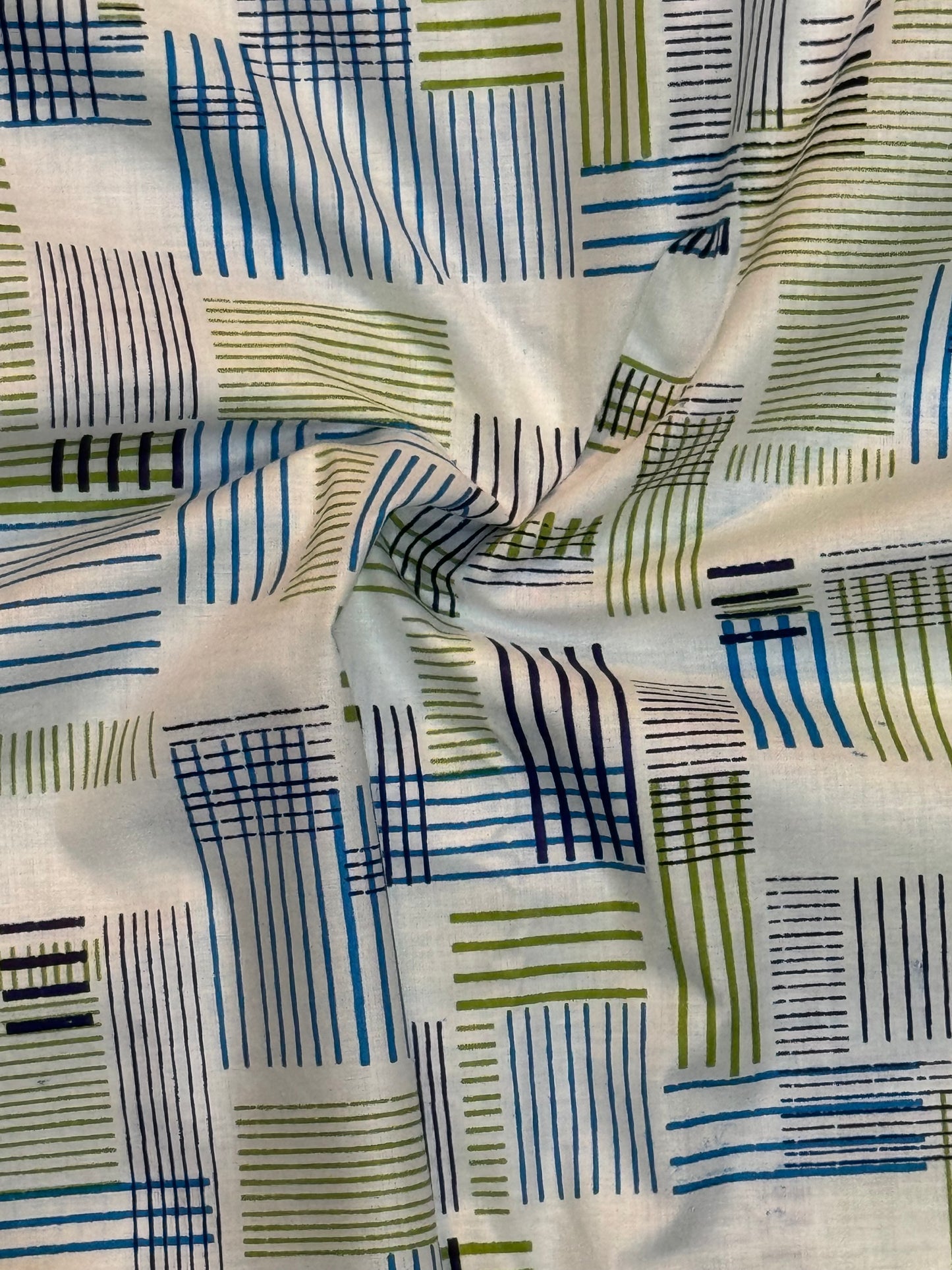 White hand block printed cotton fabric with blue green lines