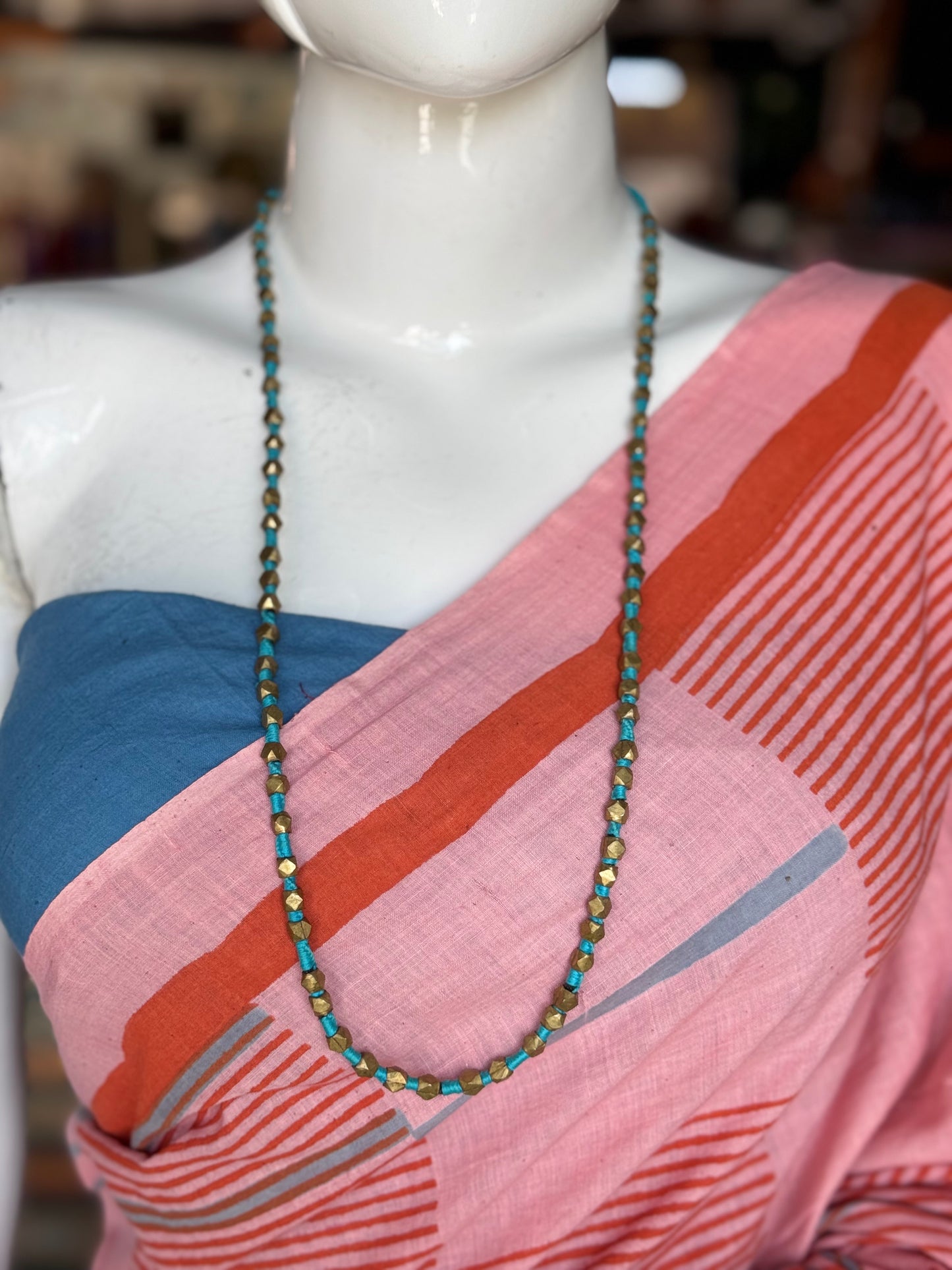 Dokra brass beads with blue thread - neckpiece