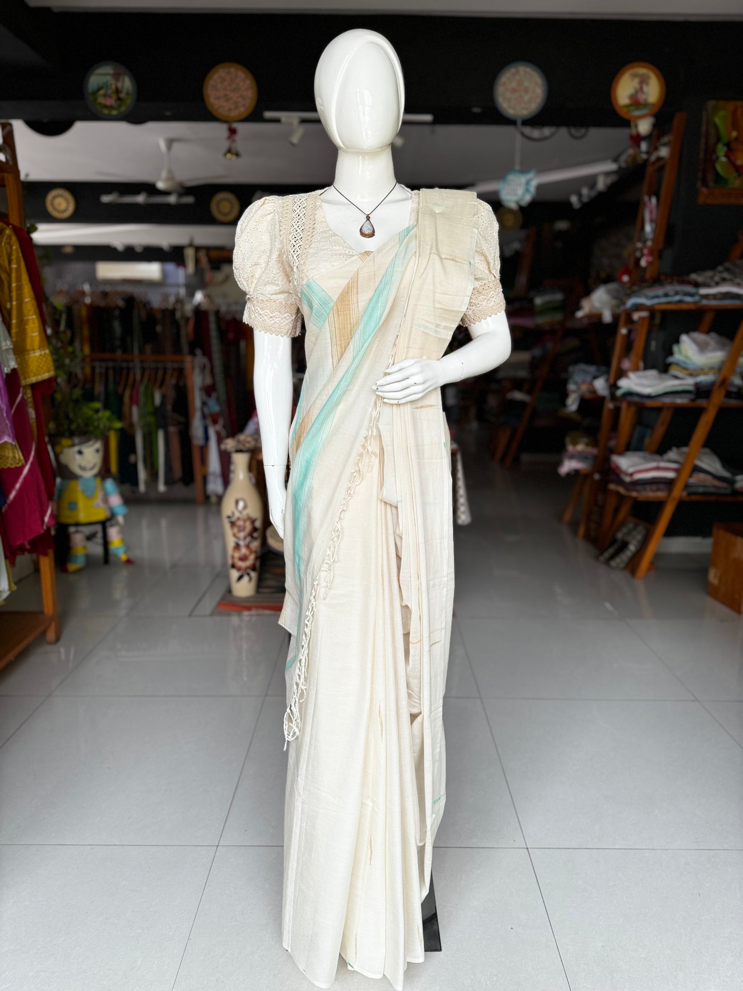 Offwhite pure soft cotton handloom saree with sea green and beige accents