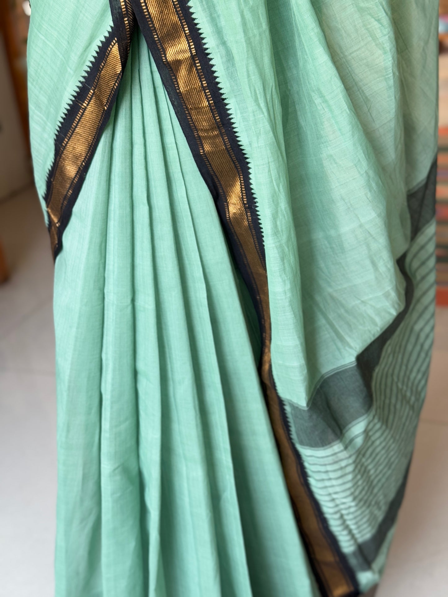 Sea green handloom cotton saree with black Kuppadam zari border