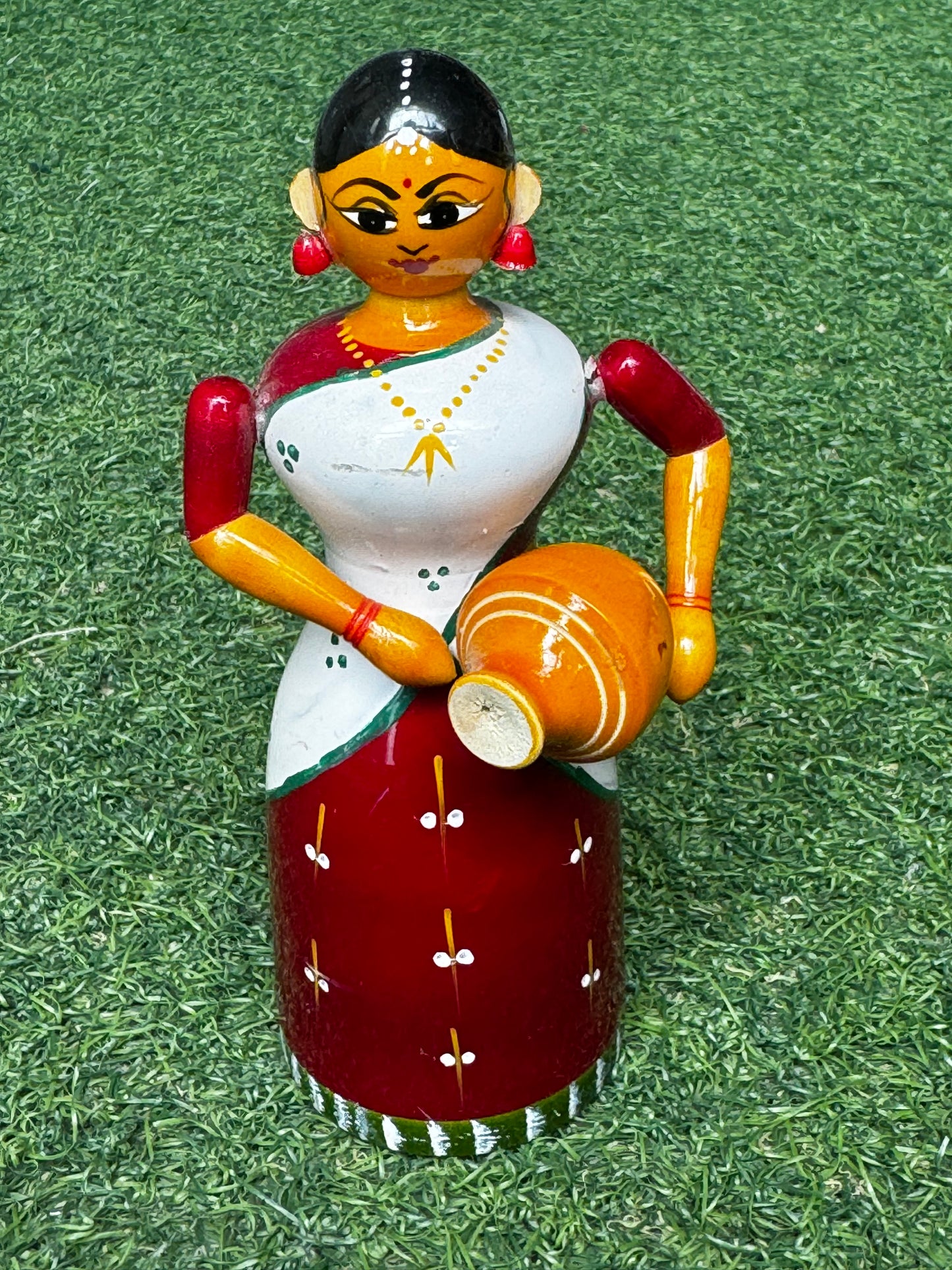 Lady in a half saree carrying pot - Etikoppaka Wooden handicraft decor