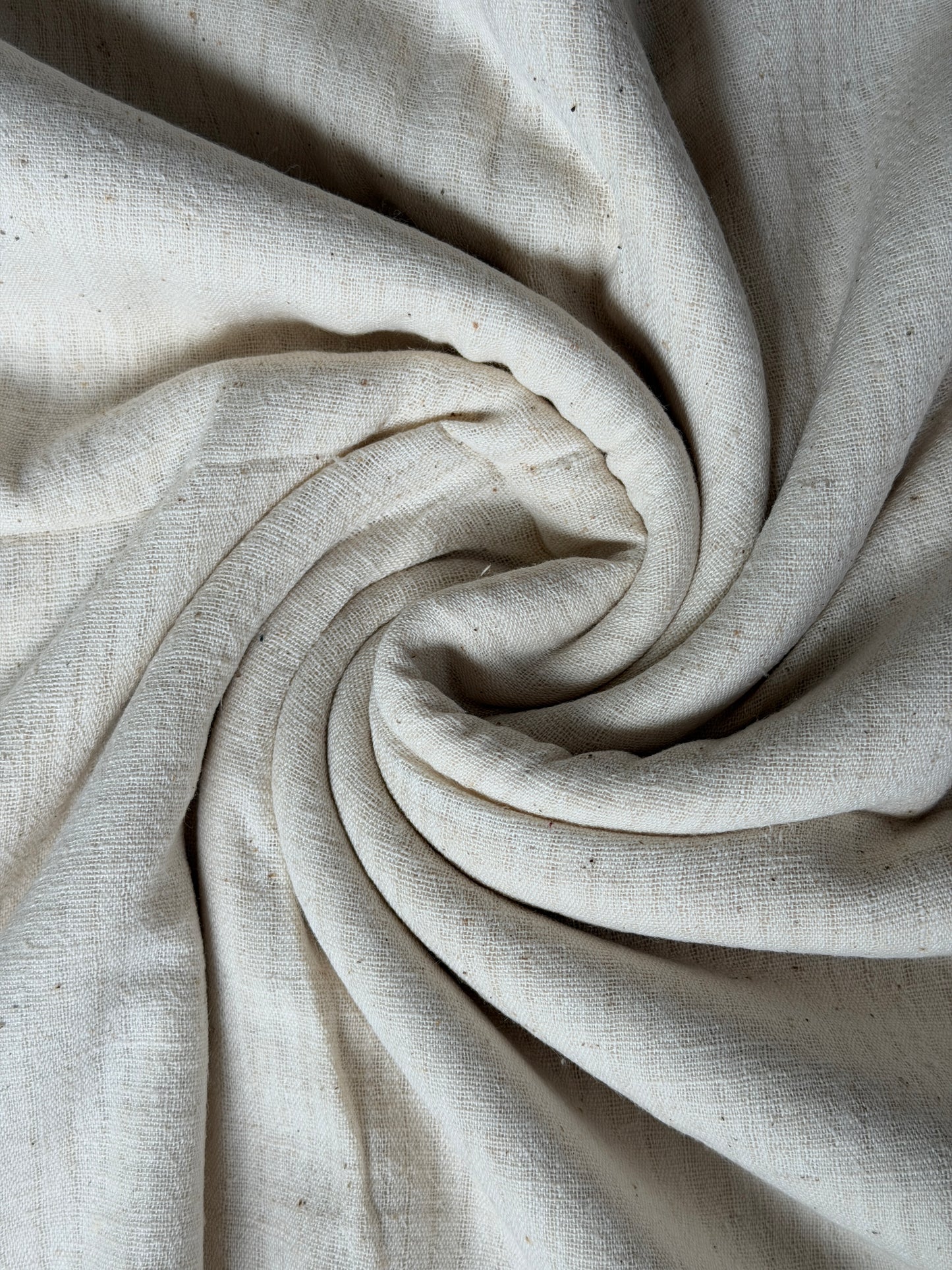 Off white kora cotton hand spun, hand woven fabric with missing thread stripes weave
