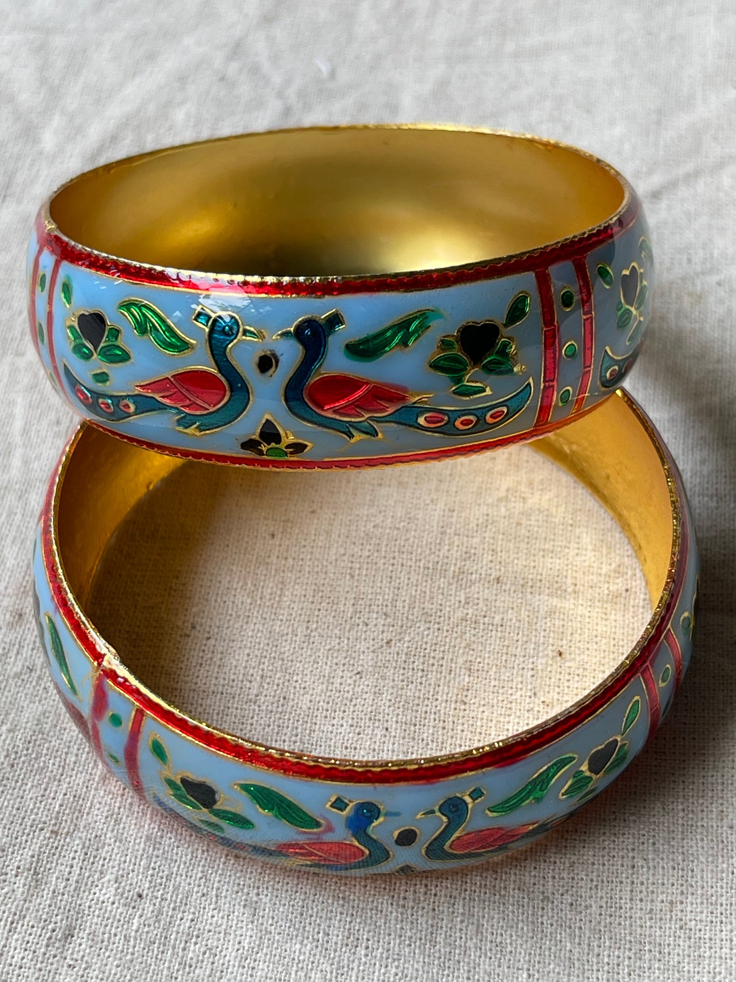 Lacquer enamel bangles pair with peacock motifs