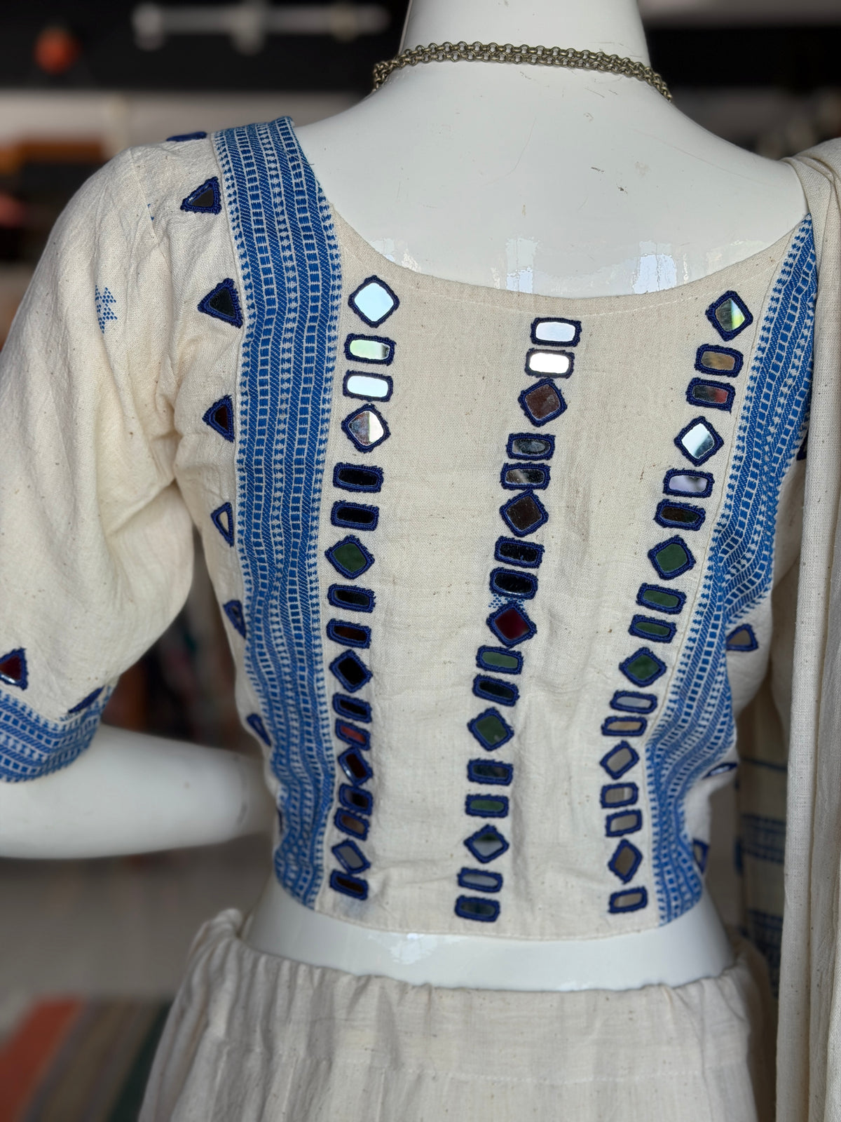 Off white Bhujodi kala cotton handloom blouse with mirror work on sleeves and back