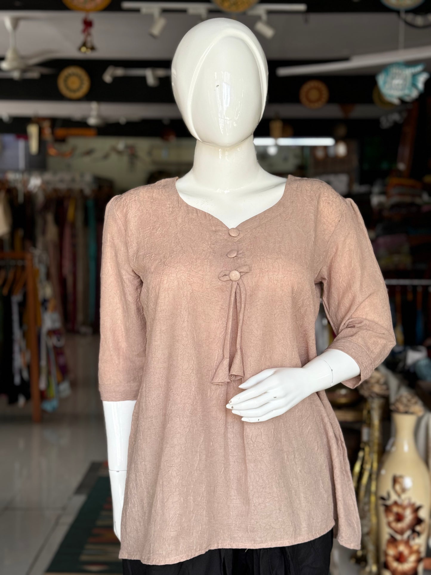 Plain crinkle fabric short tunic with buttons detailing