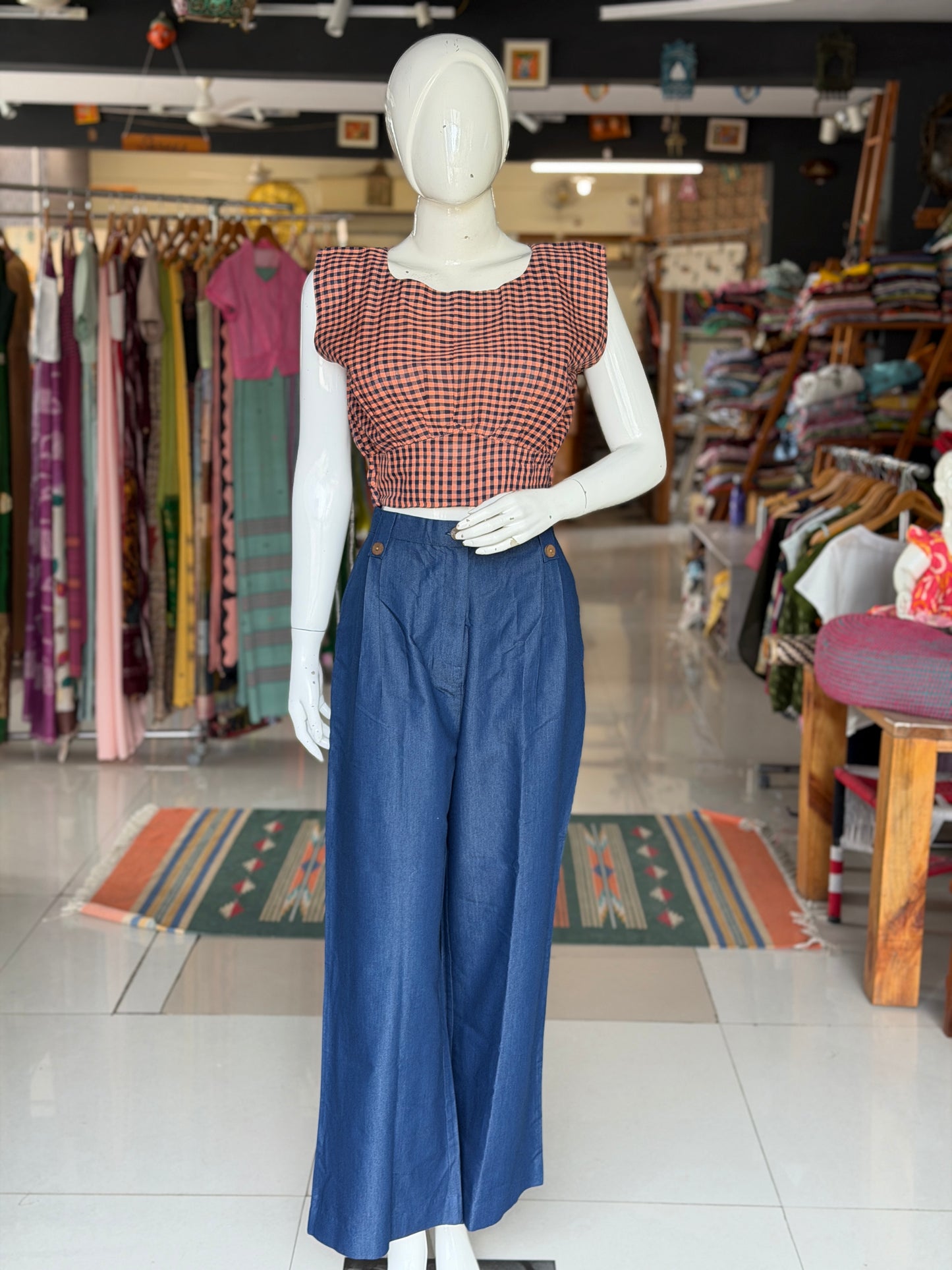 Blue cotton denim pleated pants with buttons detailing