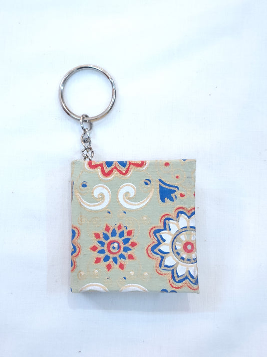 Key ring with small hand made paper notebook