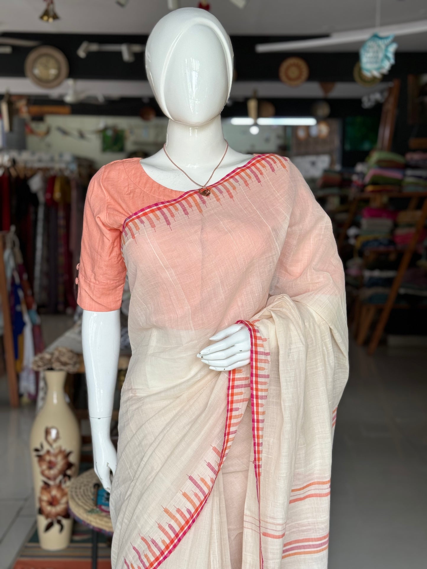 Off white hand spun hand woven cotton saree with beautiful pink border