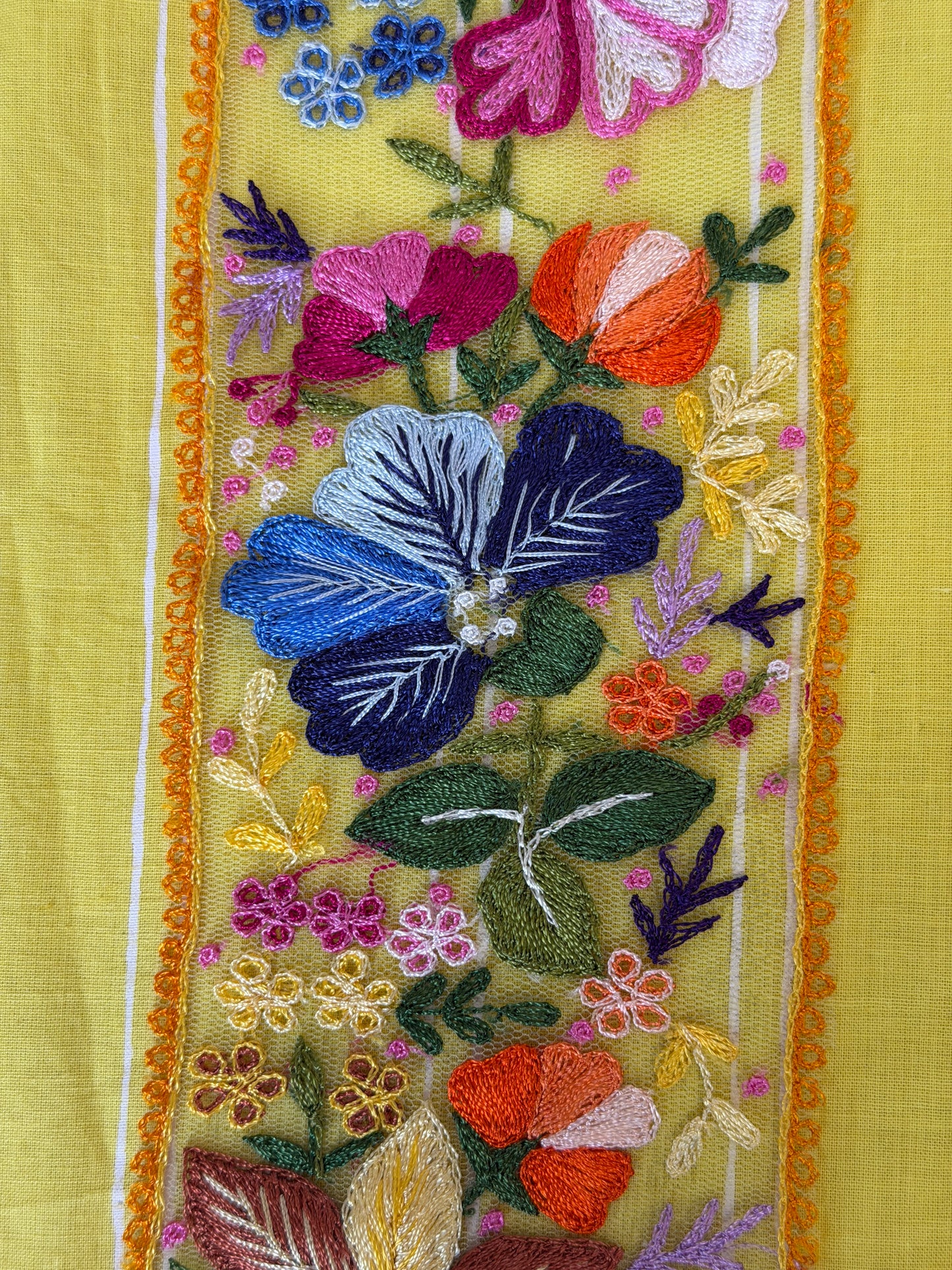 Yellow flowers and leaves embroidered patch border on yellow net base