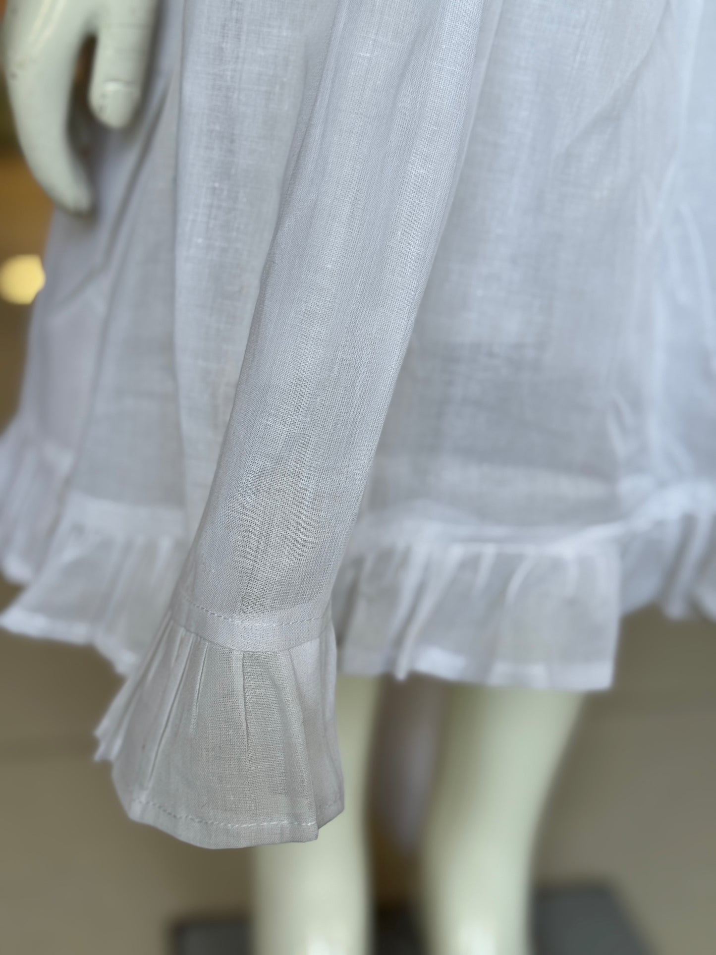 White hand embroidered smocking cotton frock for girls with collar and frills at hem