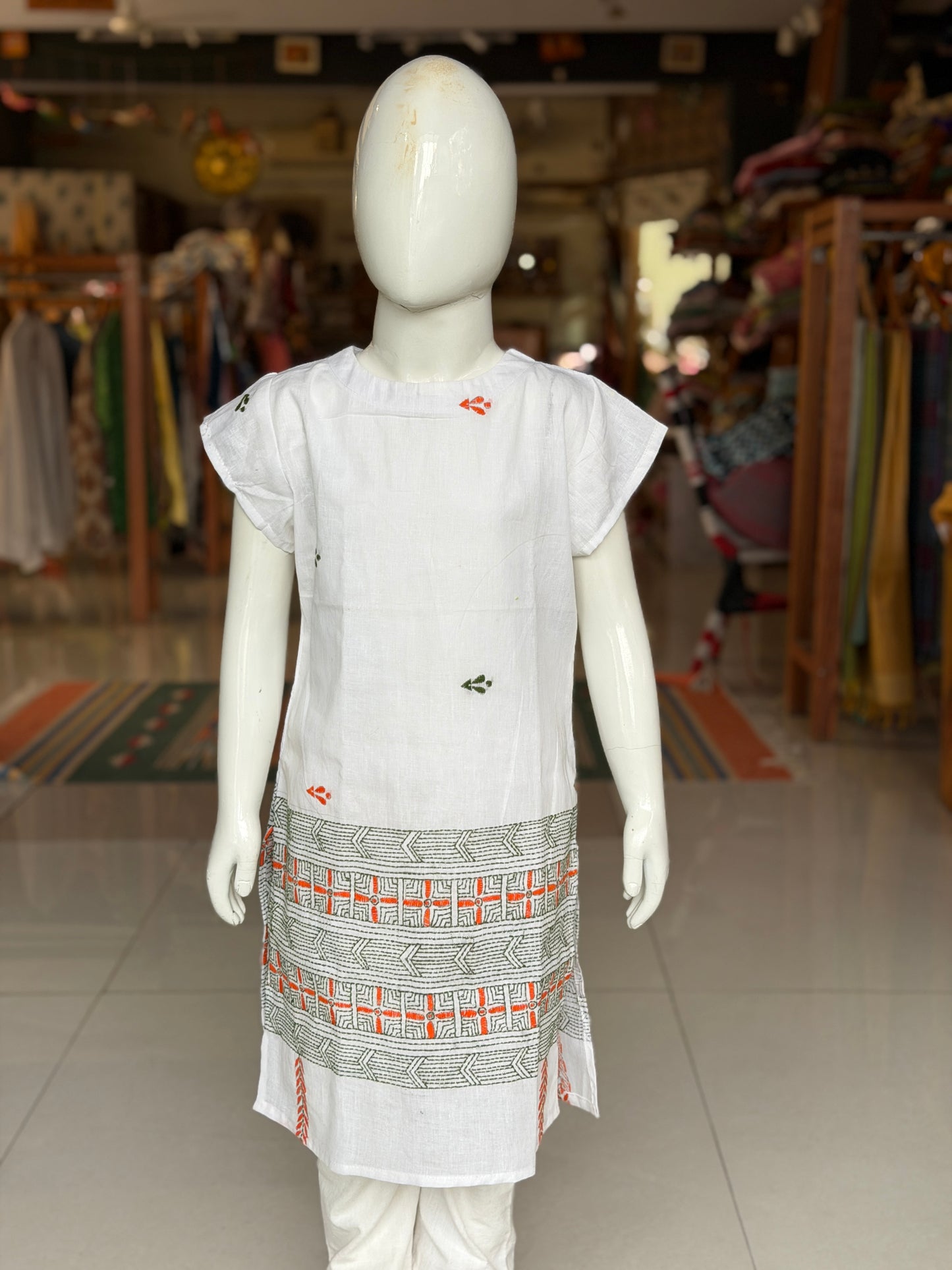 White cotton straight cut Kurti for girls with orange and green Kantha hand embroidery