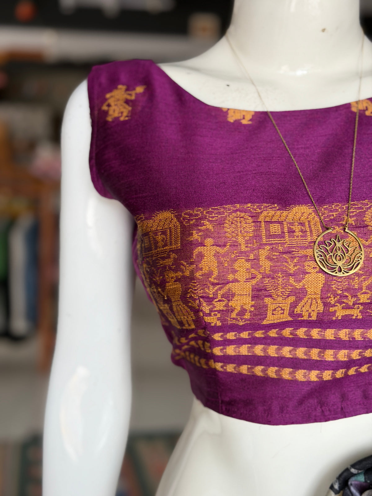 Purple handwoven raw silk sleeveless blouse with golden village motifs