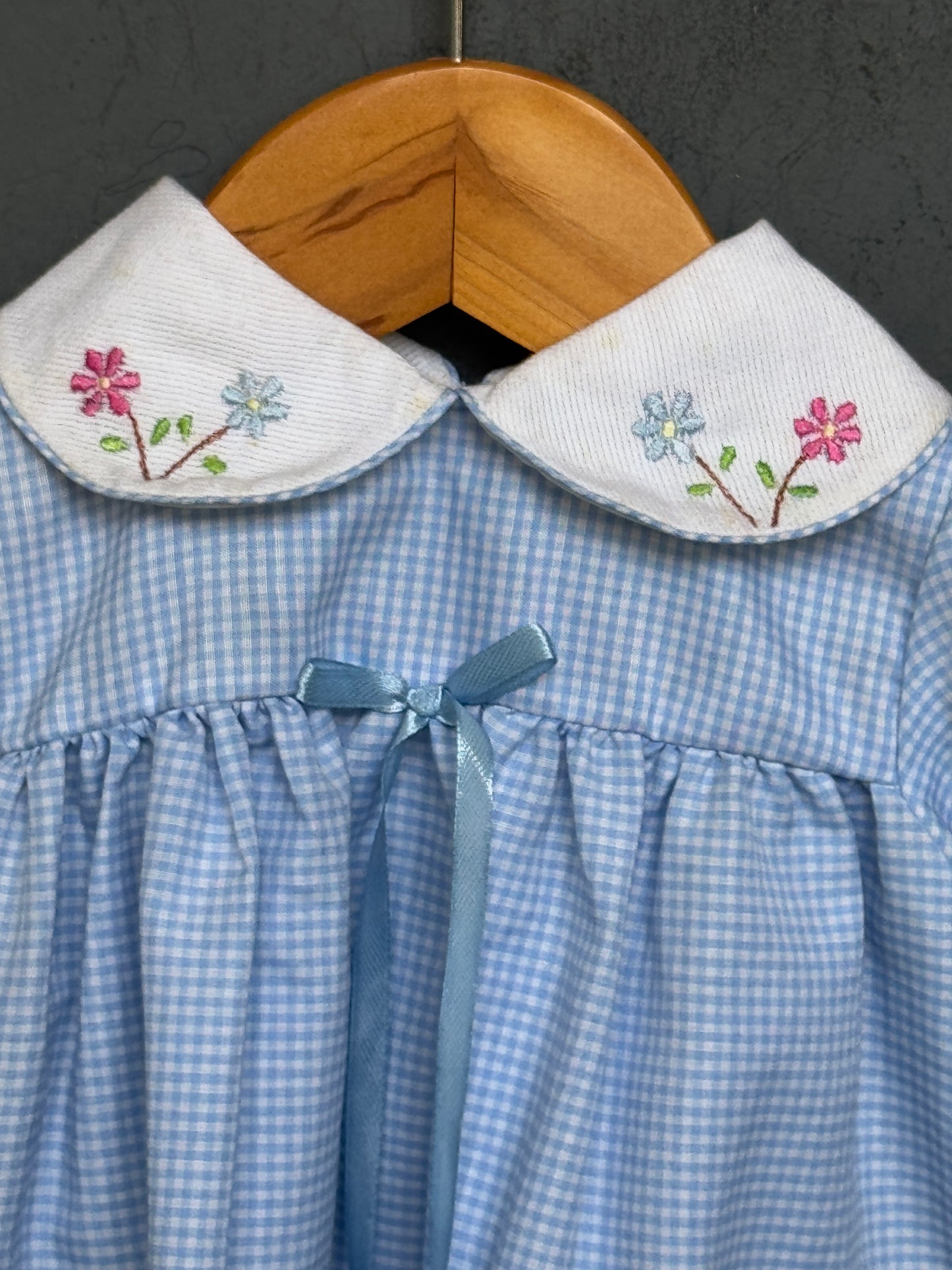 Checks cotton frock with cute embroidered hemline and collar