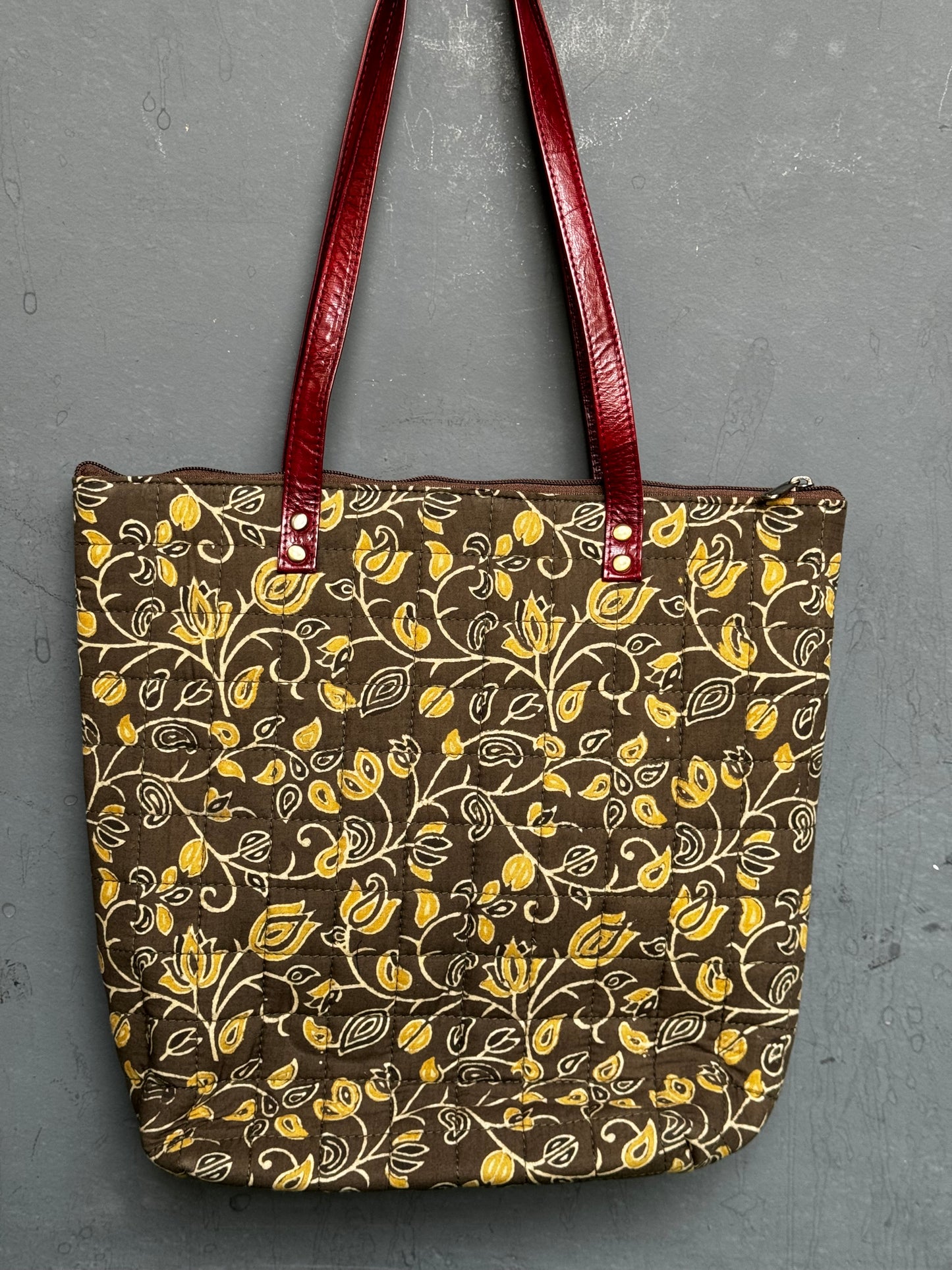 Quilted hand block printed, hand crafted fabric tote bag with front pocket and leather handles