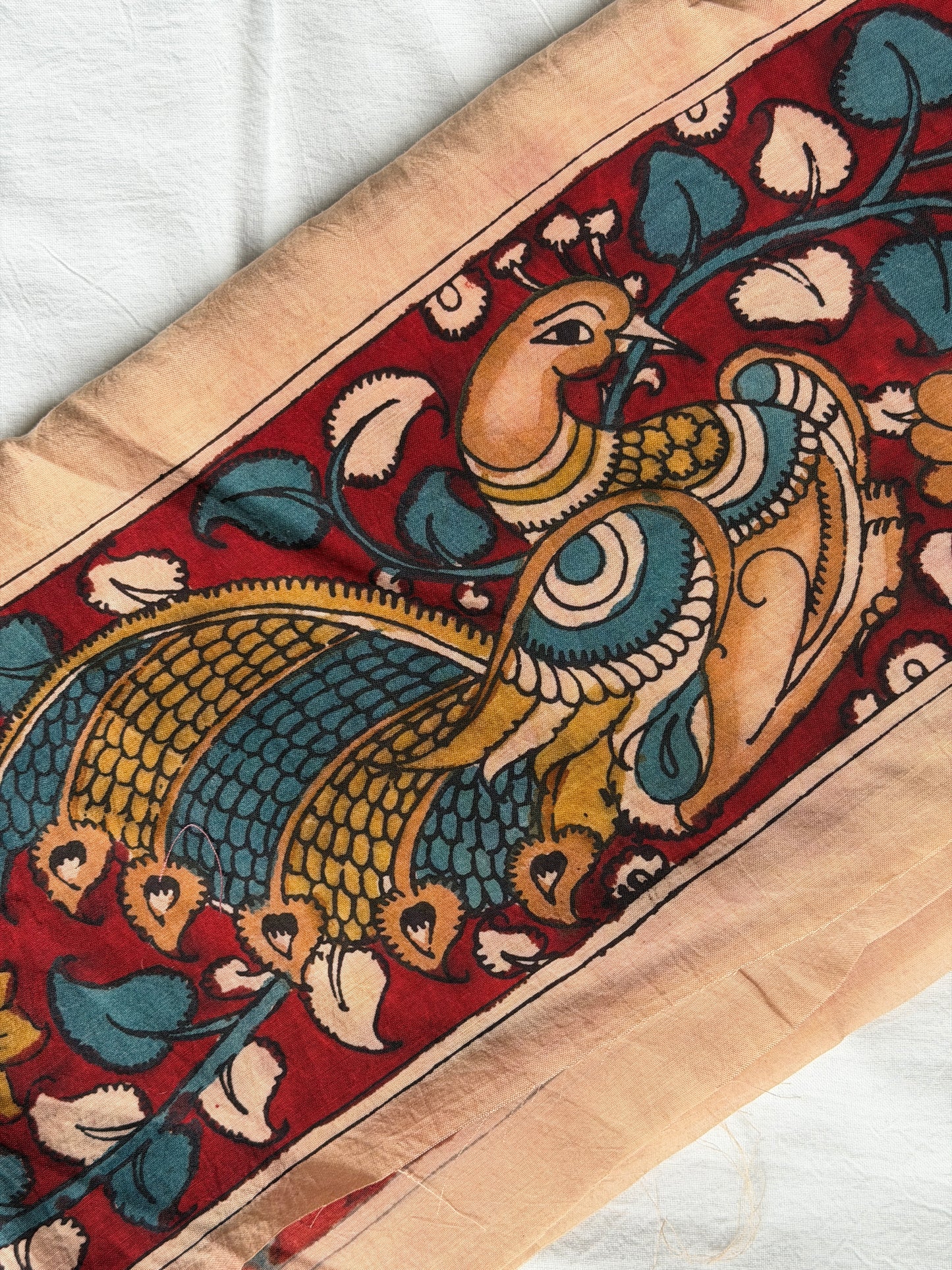 Maroon Silk pen Kalamkari hand painted border with peacocks and flowers design