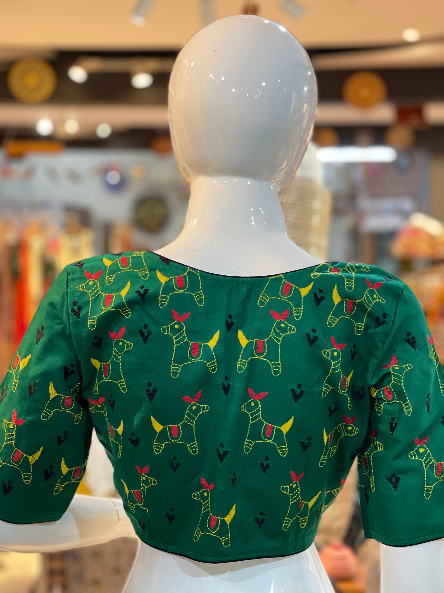 Green cotton hand embroidered kantha work blouse with lace and animals embroidery on back