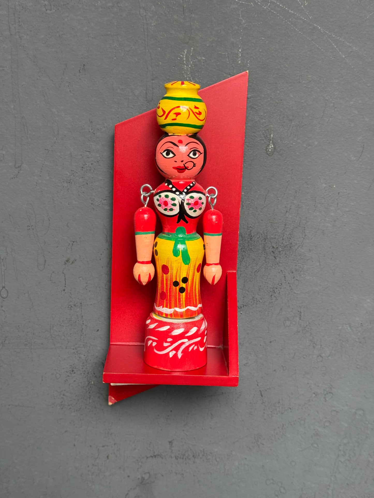 Red wooden wall shelf