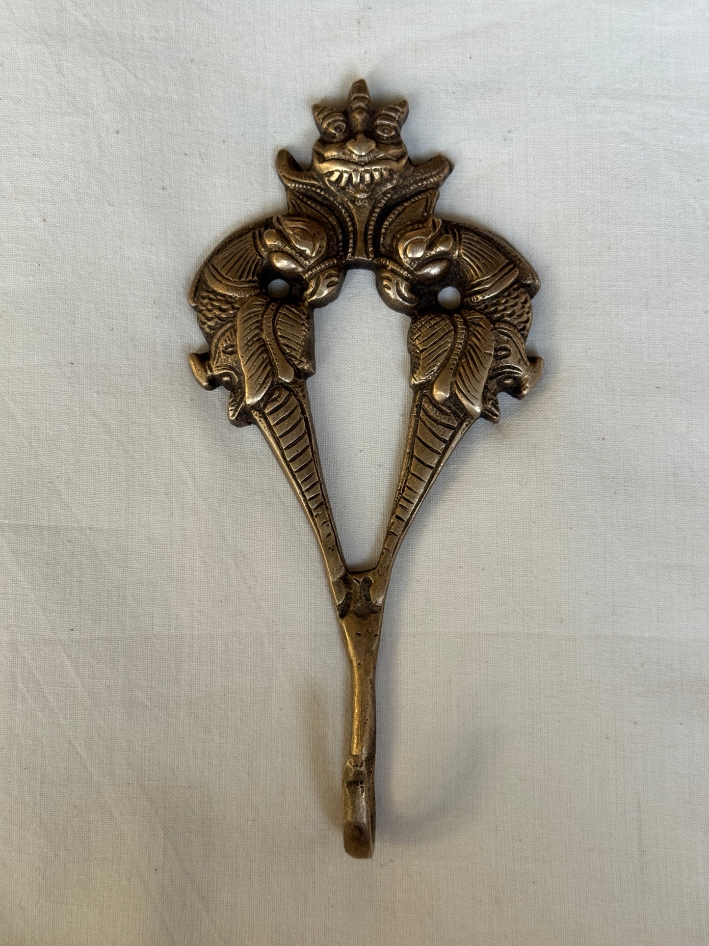 Two peacocks and a face - Brass key / coat hanger