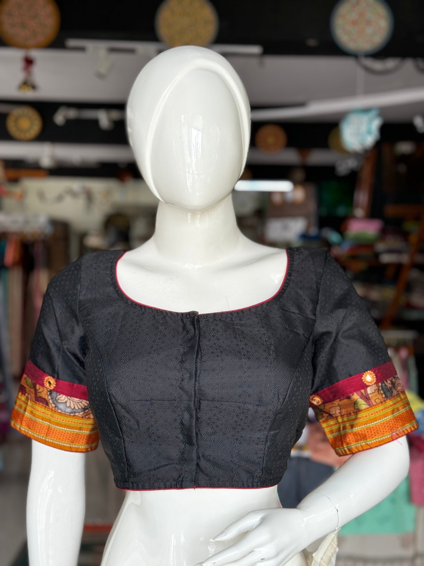 Black Khun blouse with mirror work and orange border