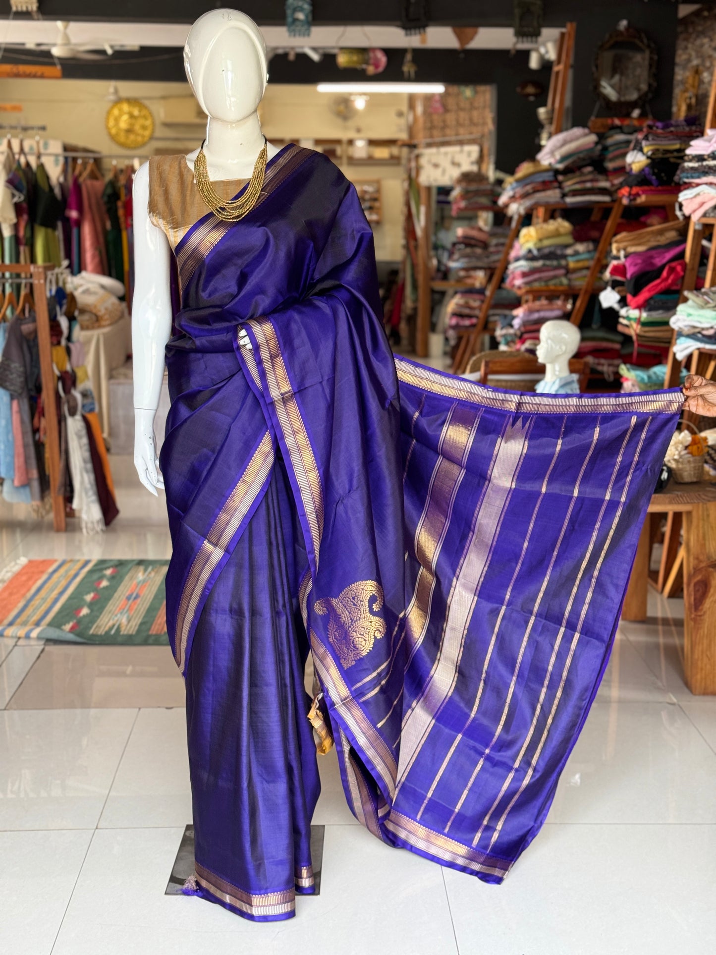 MS blue pure silk handloom Kumbakonam pattu saree with paisley corner motif and stripes border