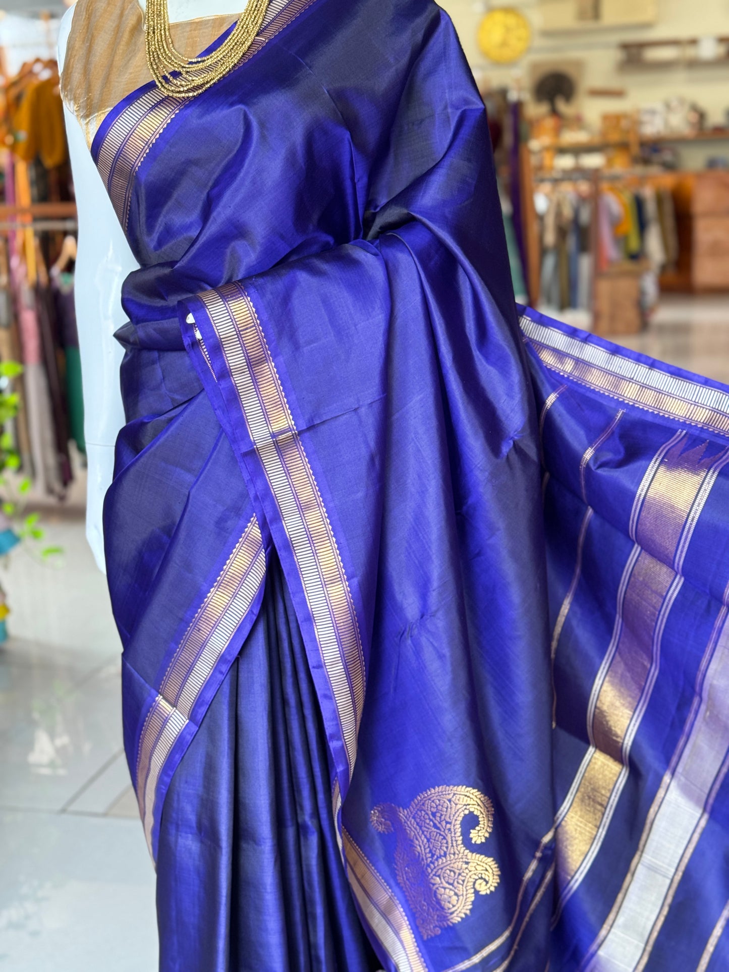 MS blue pure silk handloom Kumbakonam pattu saree with paisley corner motif and stripes border