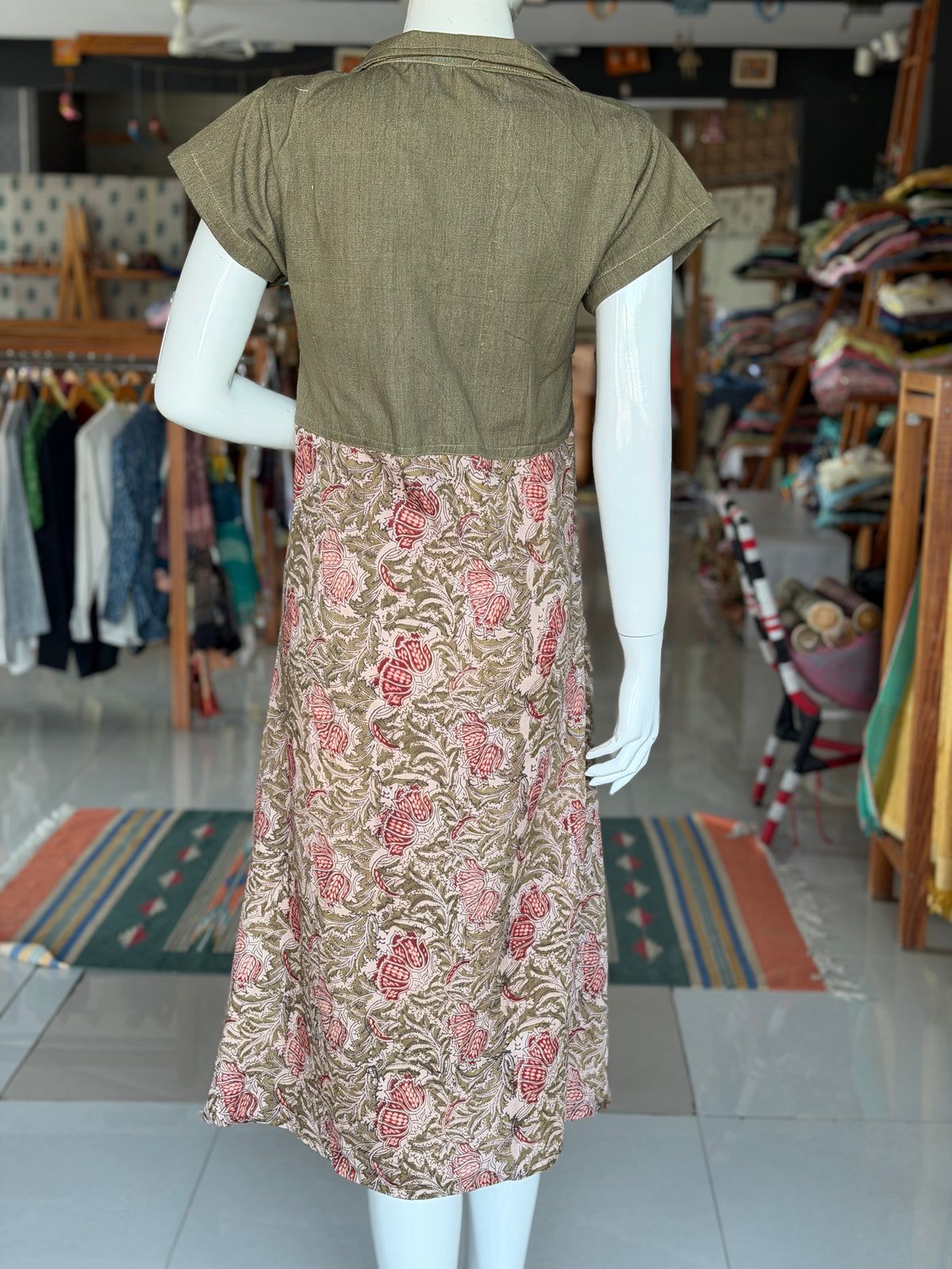 Green denim weave cotton hand woven playful shirt look dress with Kalamkari hand block prints