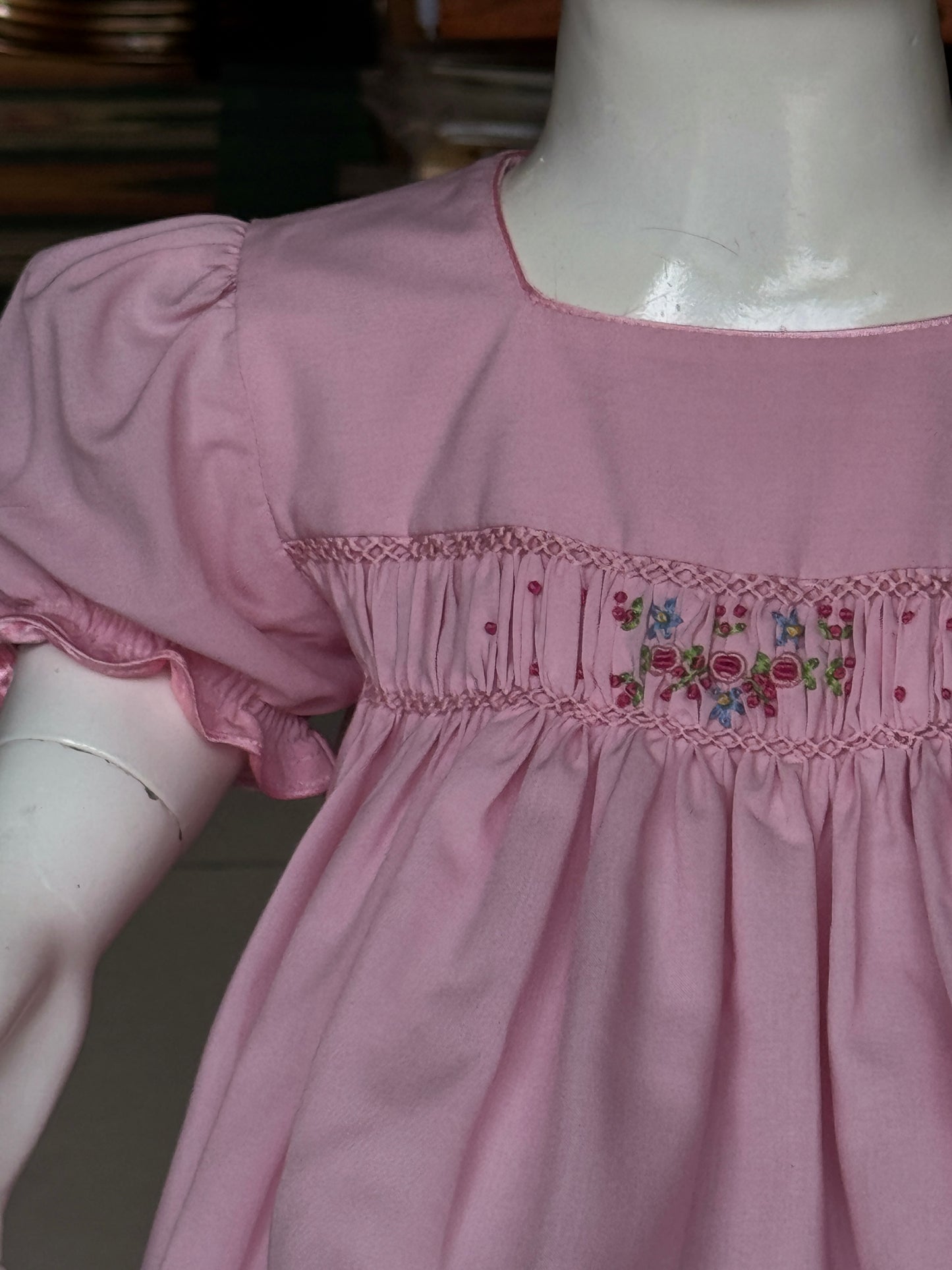 Pink smocking square neck cotton frock with hand embroidery and pink trims