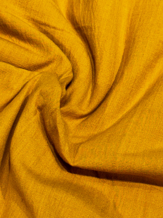 Mustard yellow soft cotton handloom fabric