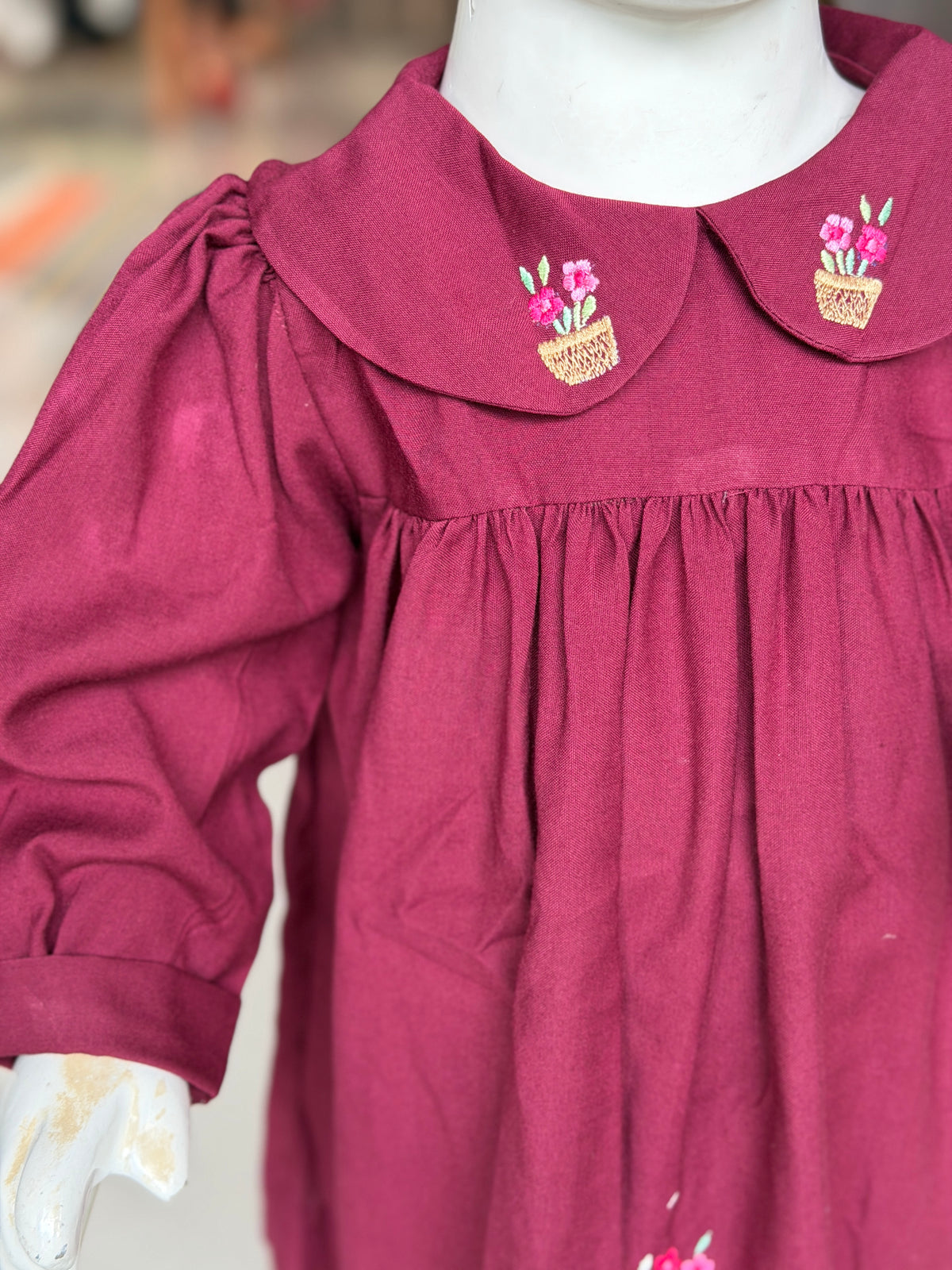 Wine tone cotton frock for girls with Peter Pan embroidered collar