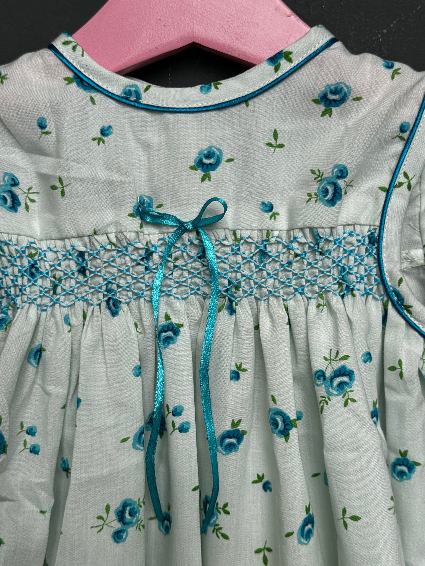 Off white turquoise floral sleevelesss smocking frock