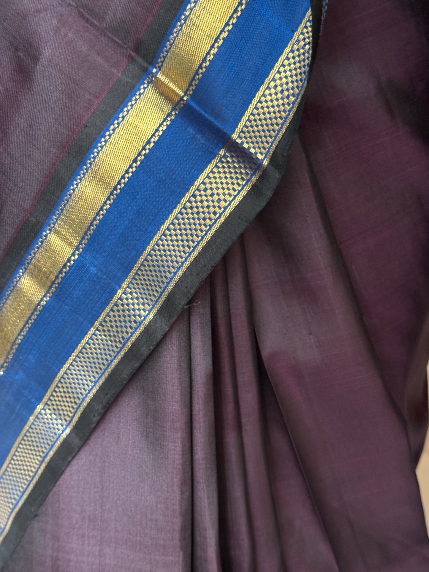 Deep burgundy shade pure silk handloom Kumbakonam pattu saree with blue border and a beautiful palla