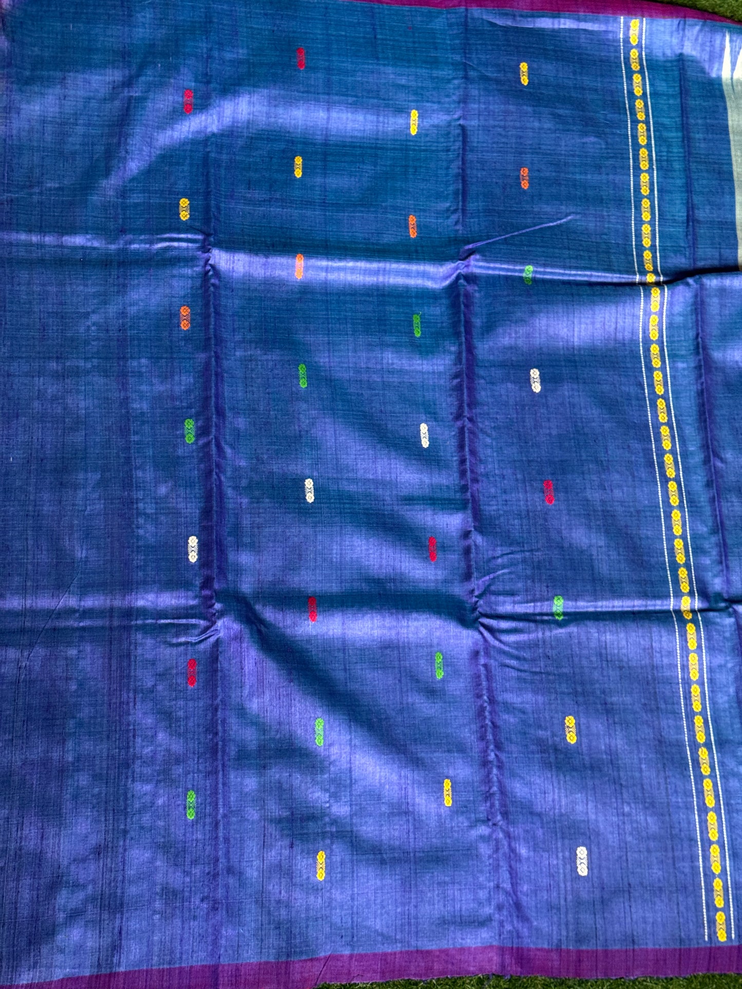 Silver blue tone pure tussar silk handwoven saree with extra weft flower butis and colorful jala palla