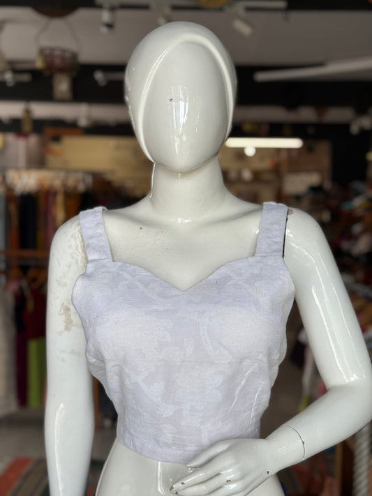 Off White cut work cotton sleeveless blouse
