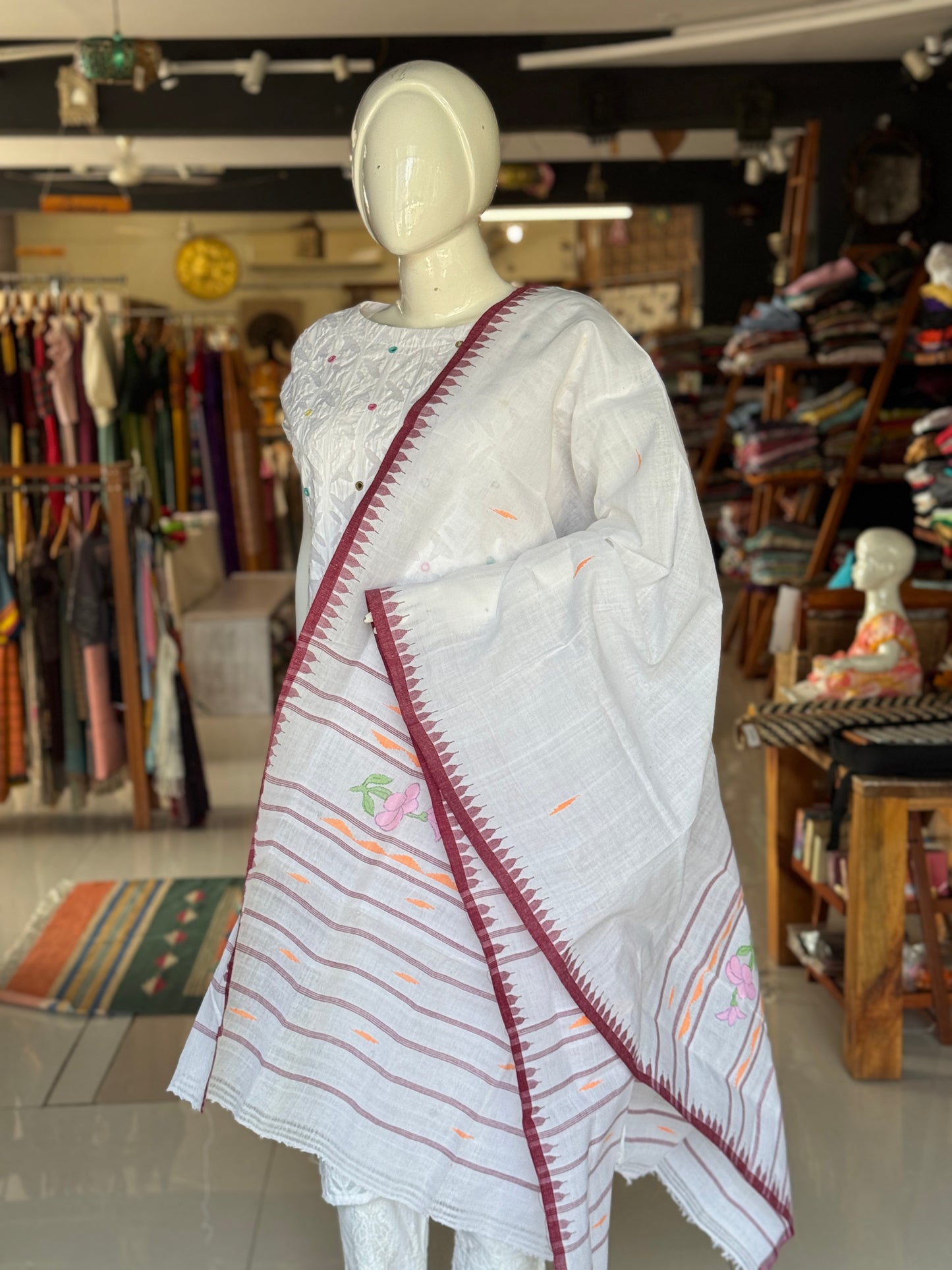White moirang phi handloom cotton dupatta with flower motifs and temple border