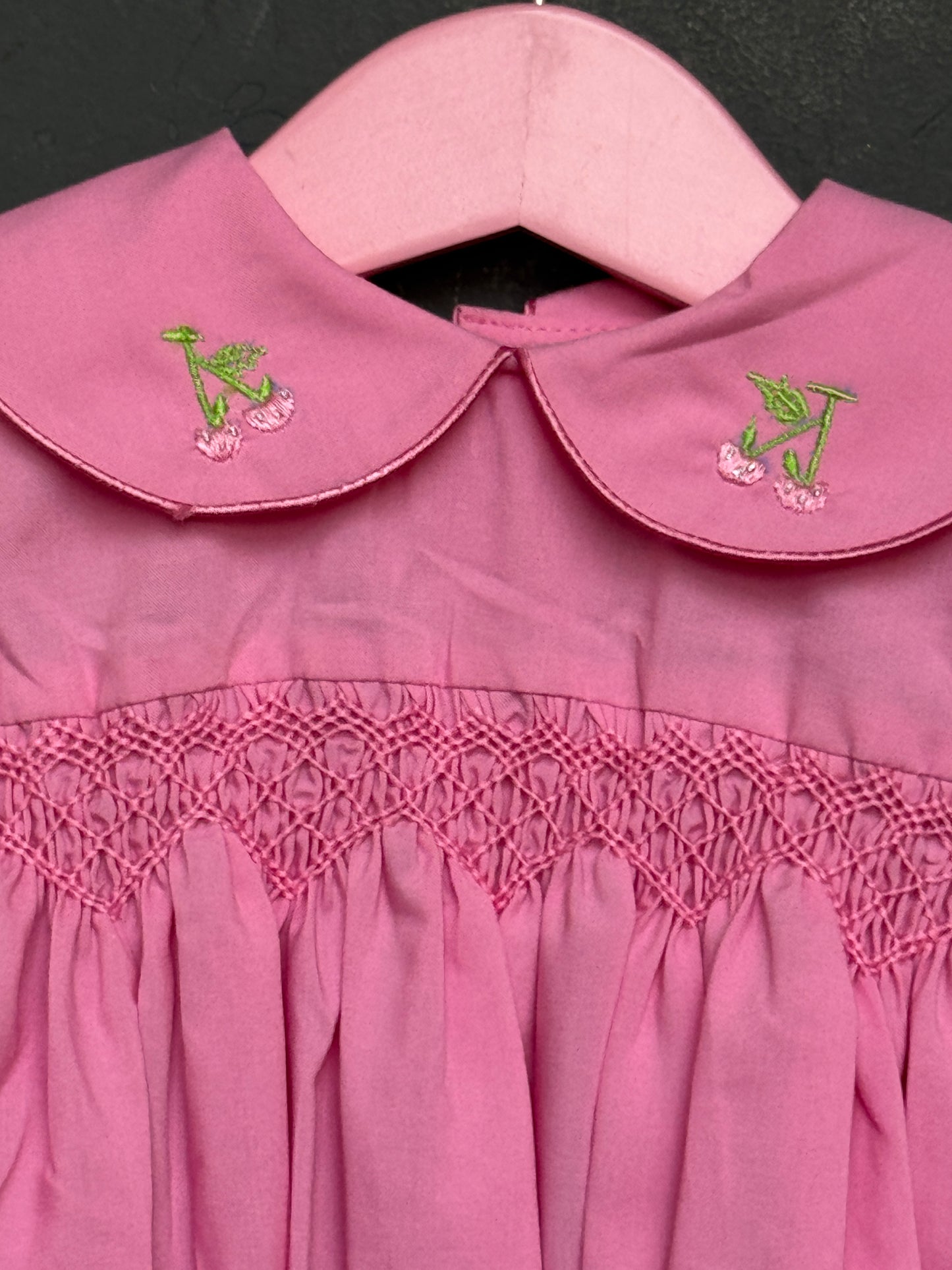 Pink smocking cotton frock for girls with embroidery on collar