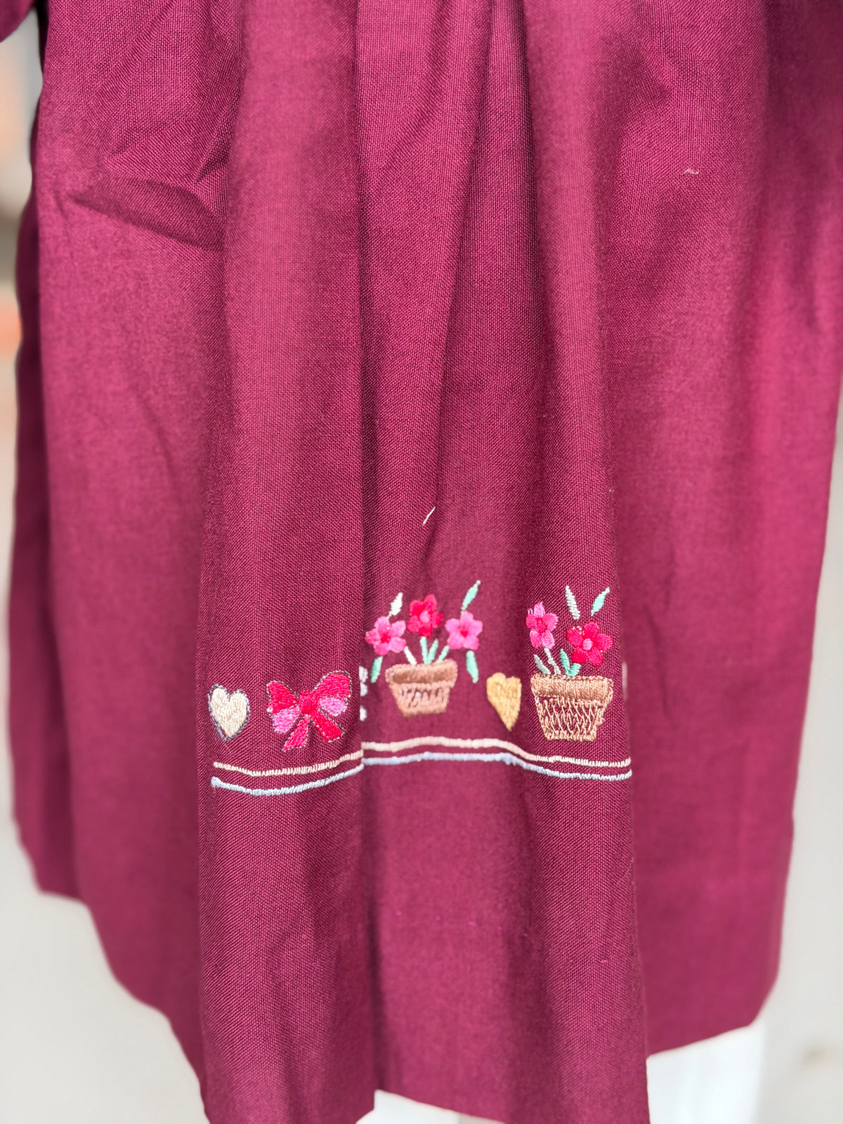 Wine tone cotton frock for girls with Peter Pan embroidered collar