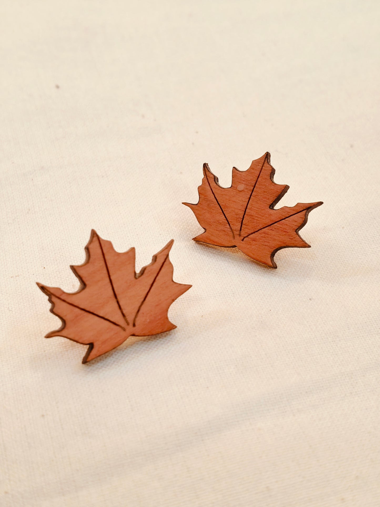 Maple leaf design earrings in wood