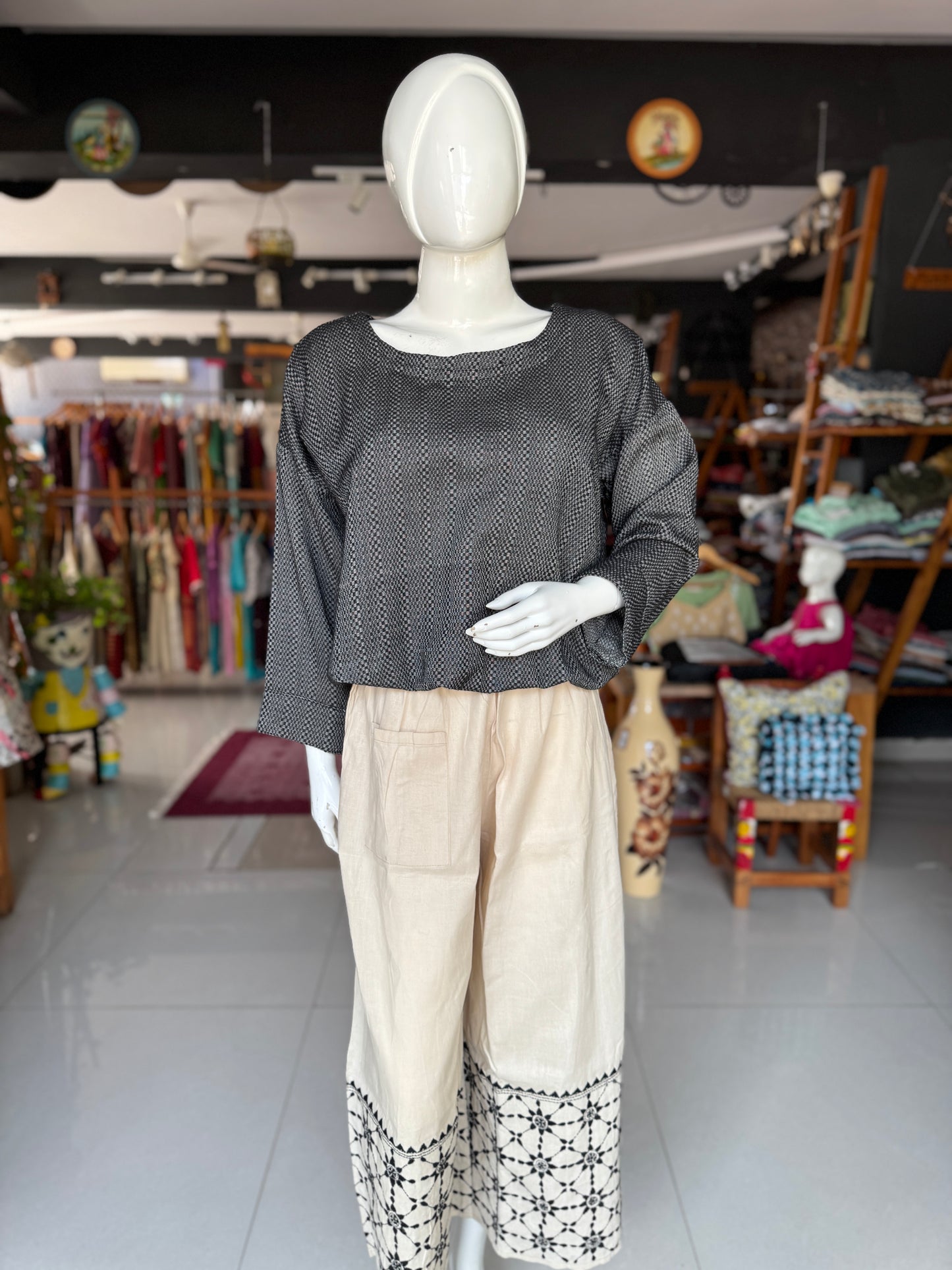 Black handloom self checks cotton top for women with elastic hem