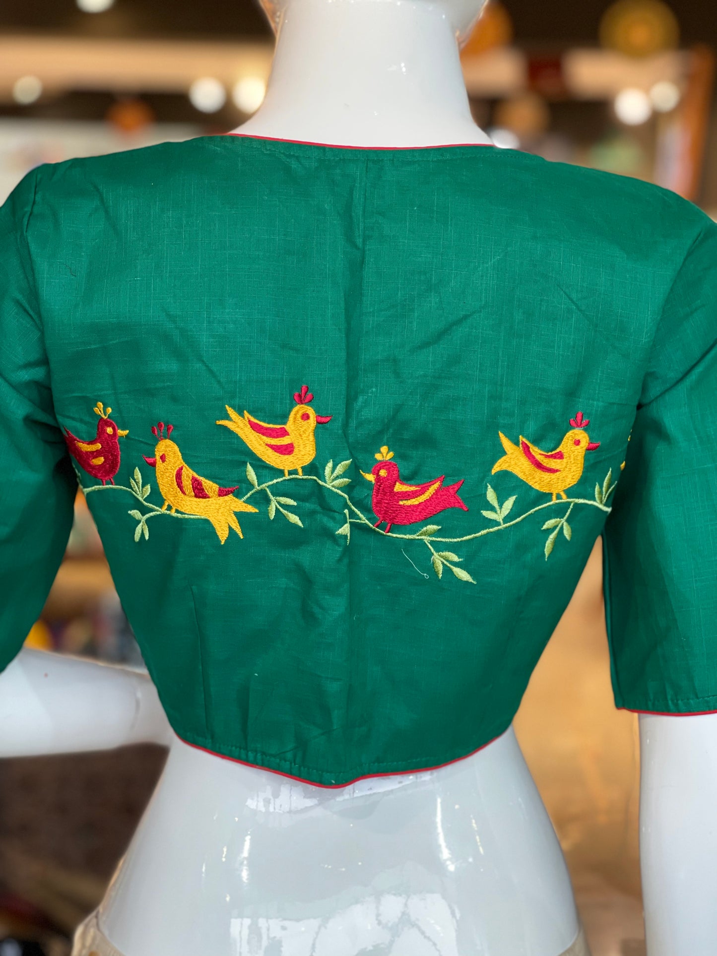 Dark green cotton blouse with birds embroidery on back