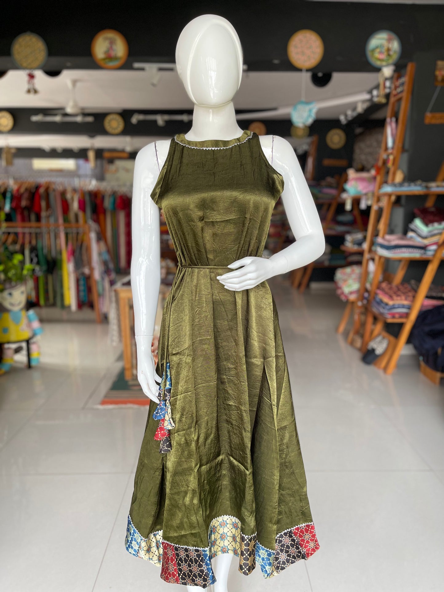 Mashru plain sleeveless dress with Ajrakh hand block printed patch border and tassles belt