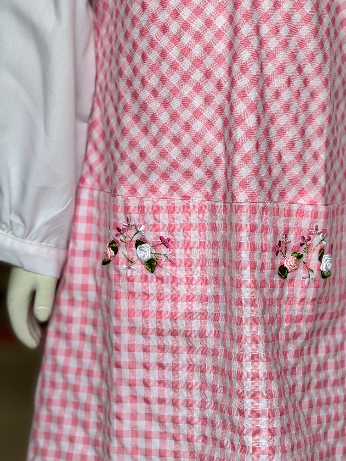 Pink and white checks frock with embroidered collar and long sleeves